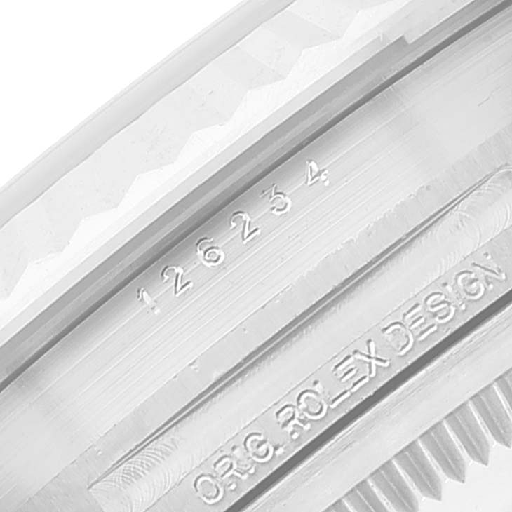 This image shows a close-up of the model number engraving on the bezel of a Rolex Datejust 126234 Men's Stainless Steel Blue Dial 126234 Men's Stainless Steel Blue Dial watch.