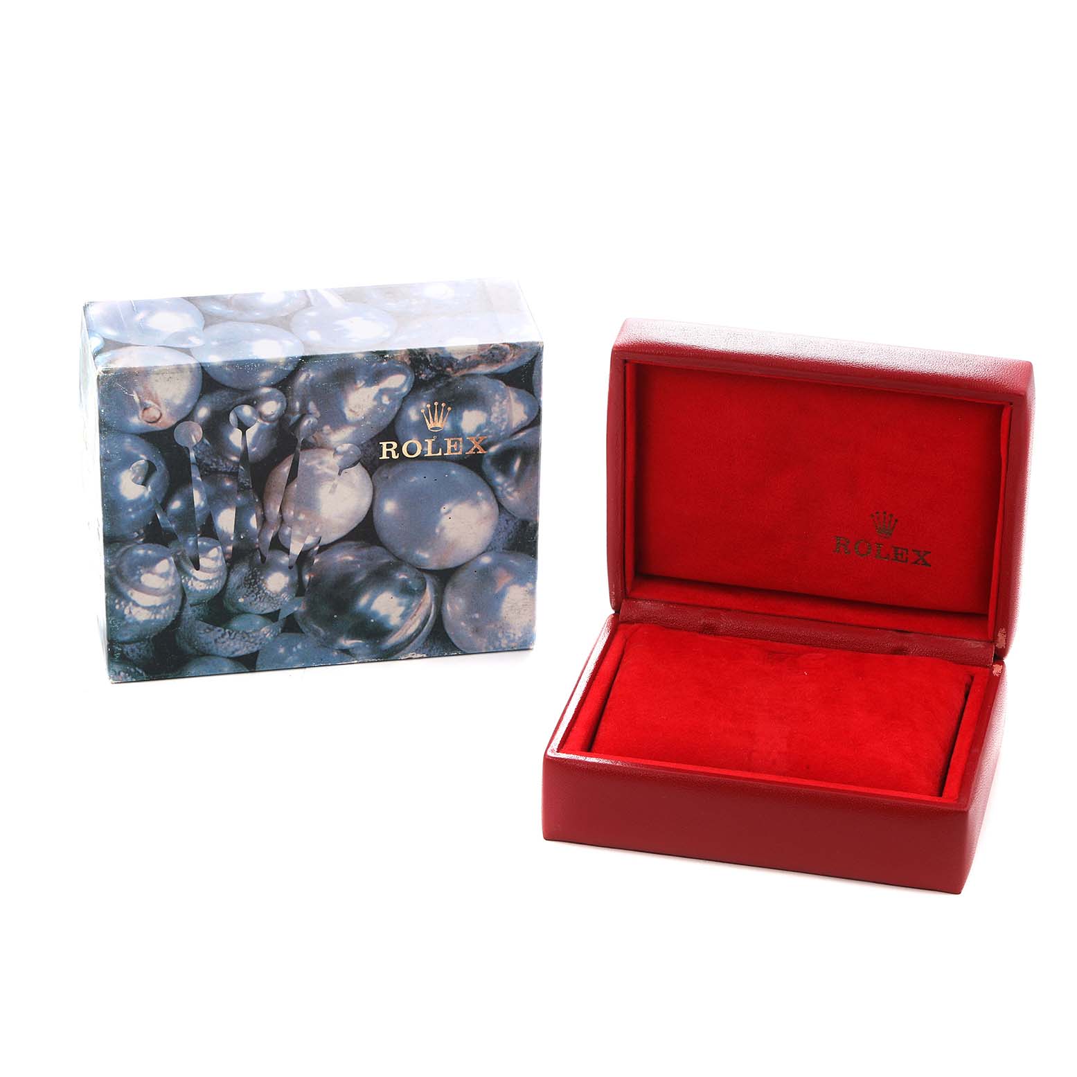 The image shows a Rolex Datejust 79174 Women
s Stainless Steel Mother of Pearl Dial box and a red watch case, both closed.