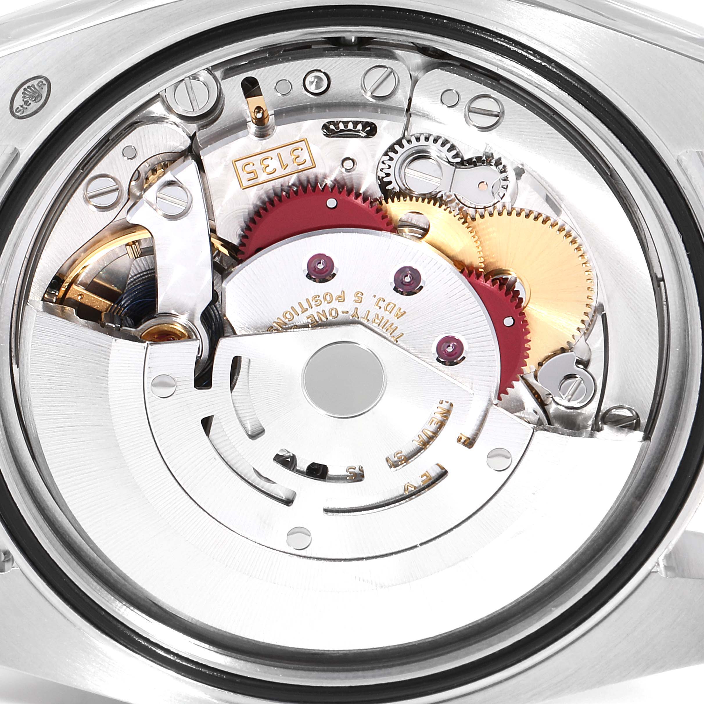 This image shows the internal movement mechanism of a Rolex Datejust 116234 Men
s Stainless Steel Mother of Pearl Dial 116234 Men
s Stainless Steel Mother of Pearl Dial watch, viewed from the back.