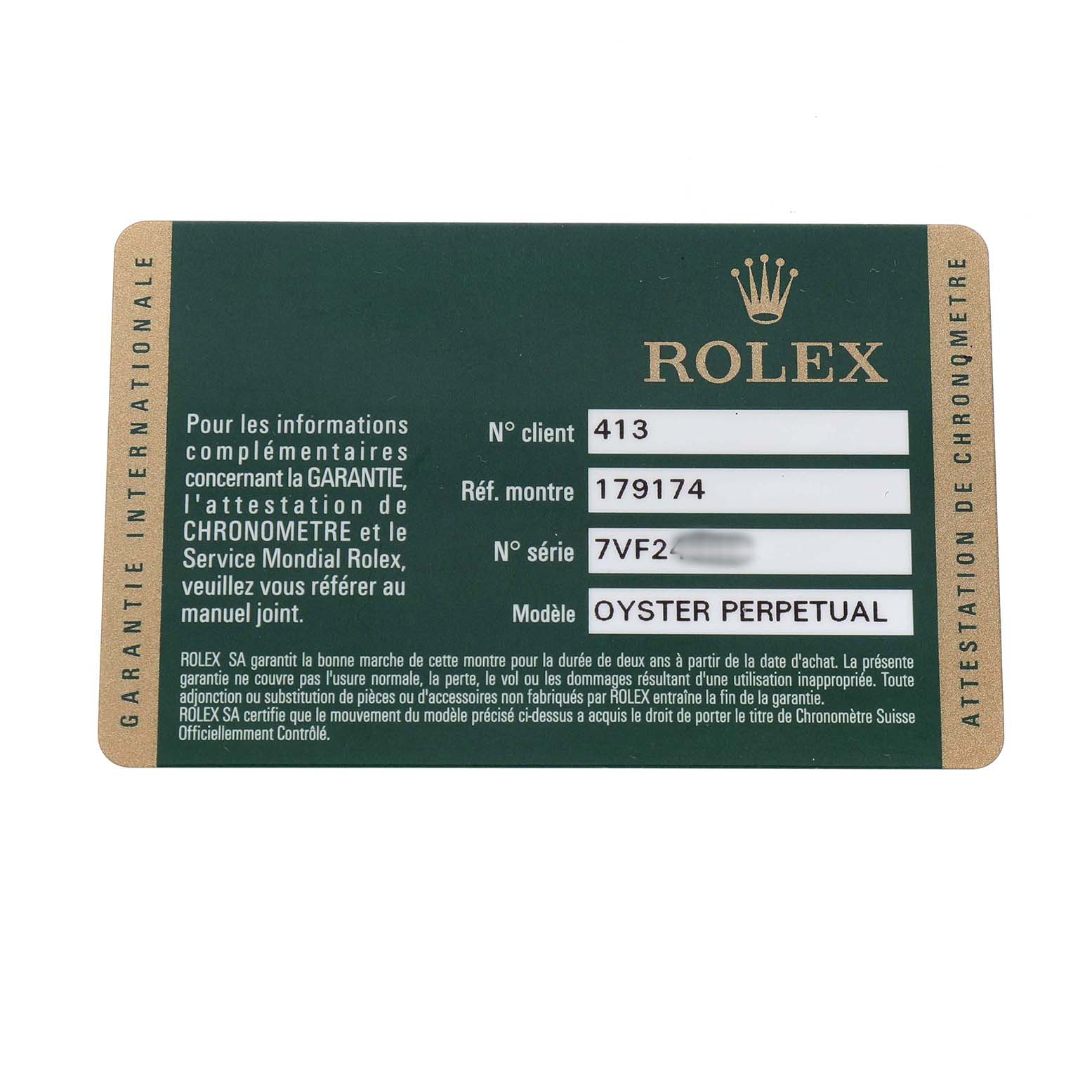 This image shows a Rolex Oyster Perpetual Datejust warranty card from a top-down angle.