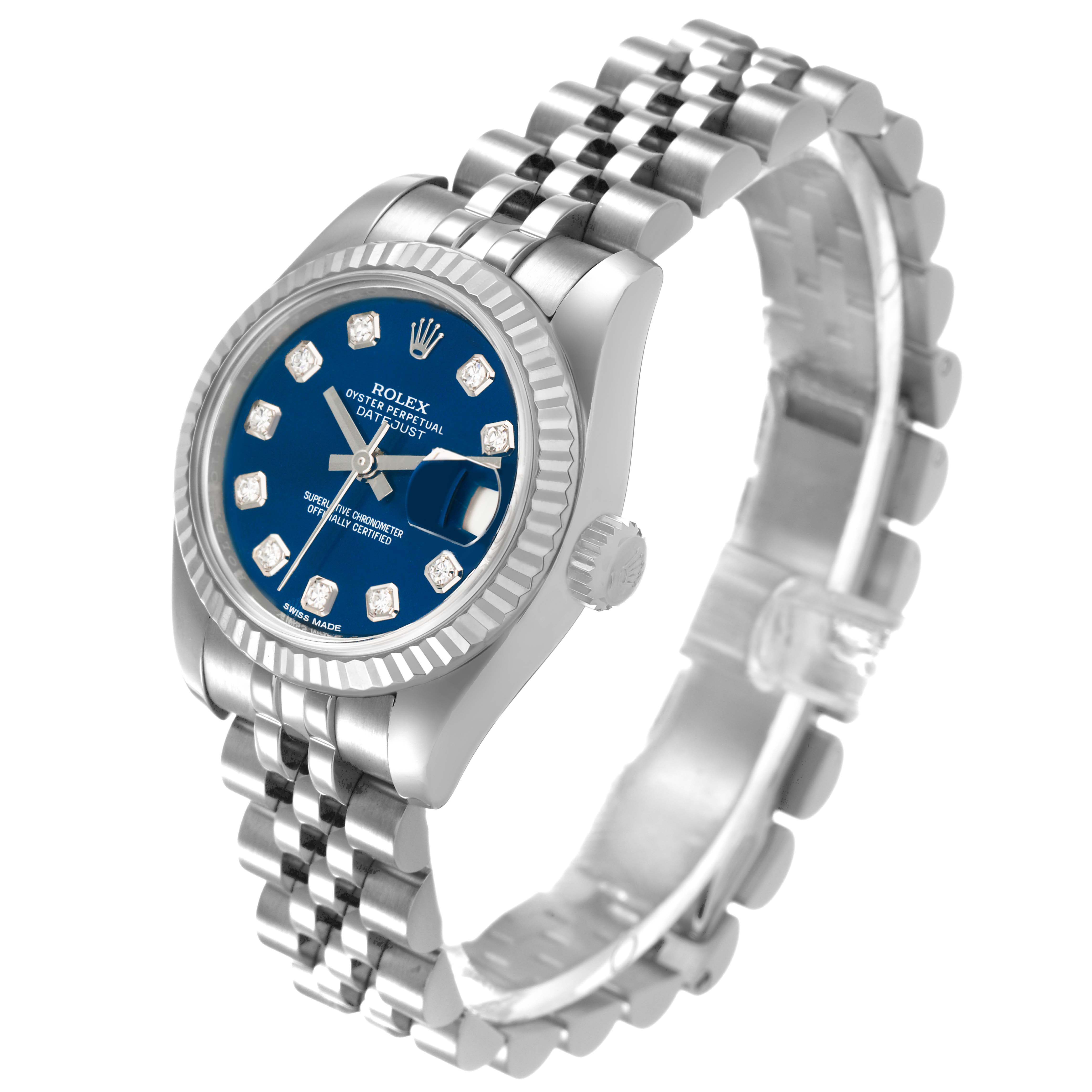 The image shows a Rolex Datejust 179174 Women's Stainless Steel Blue Dial watch at a three-quarter angle, highlighting the blue dial, diamond markers, and Jubilee bracelet.
