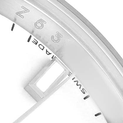 The image shows a partial close-up of the Rolex Datejust 179174 Women's Stainless Steel White Dial's dial, focusing on the edge, date window, and markers.