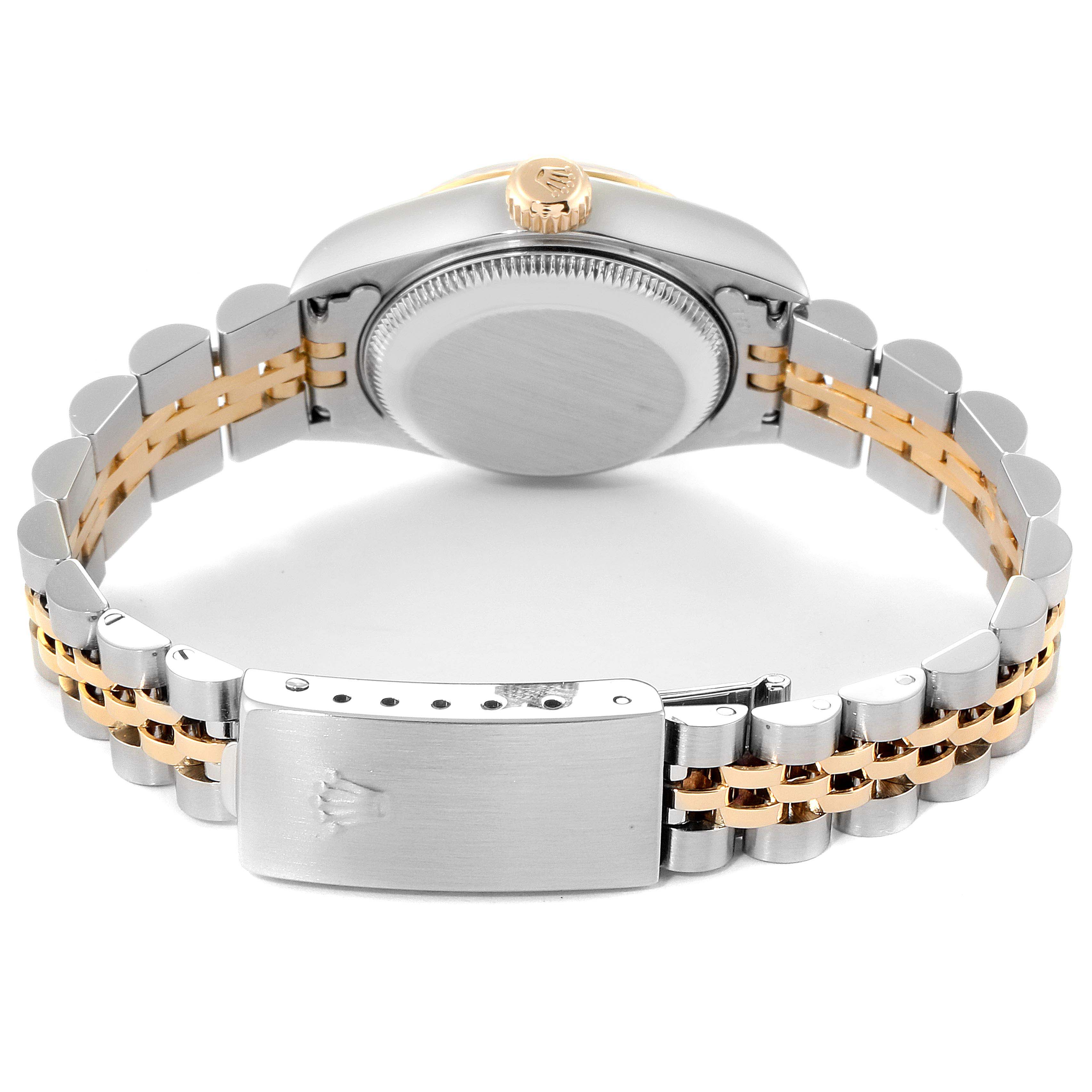 This image shows the back case, crown, and bracelet of a Rolex Datejust 79173 Women's Steel and Gold (two tone) Black Dial 79173 Women's Steel and Gold (two tone) Black Dial watch, shot from the rear angle.