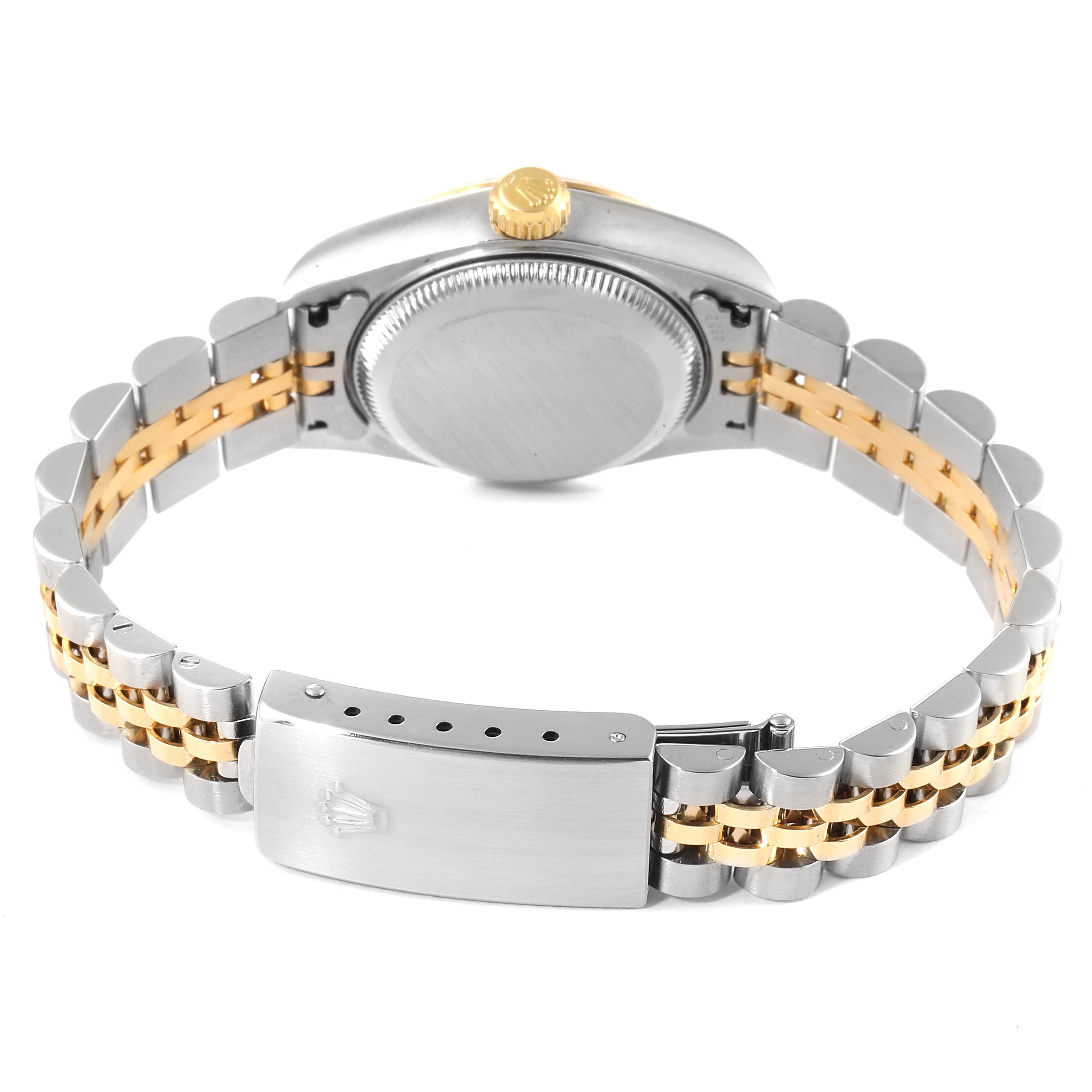 The image shows the back view of a Rolex Datejust 79173 Women's Steel and Gold (two tone) Champagne Dial 79173 Women's Steel and Gold (two tone) Champagne Dial watch, highlighting its two-tone metal bracelet and clasp.