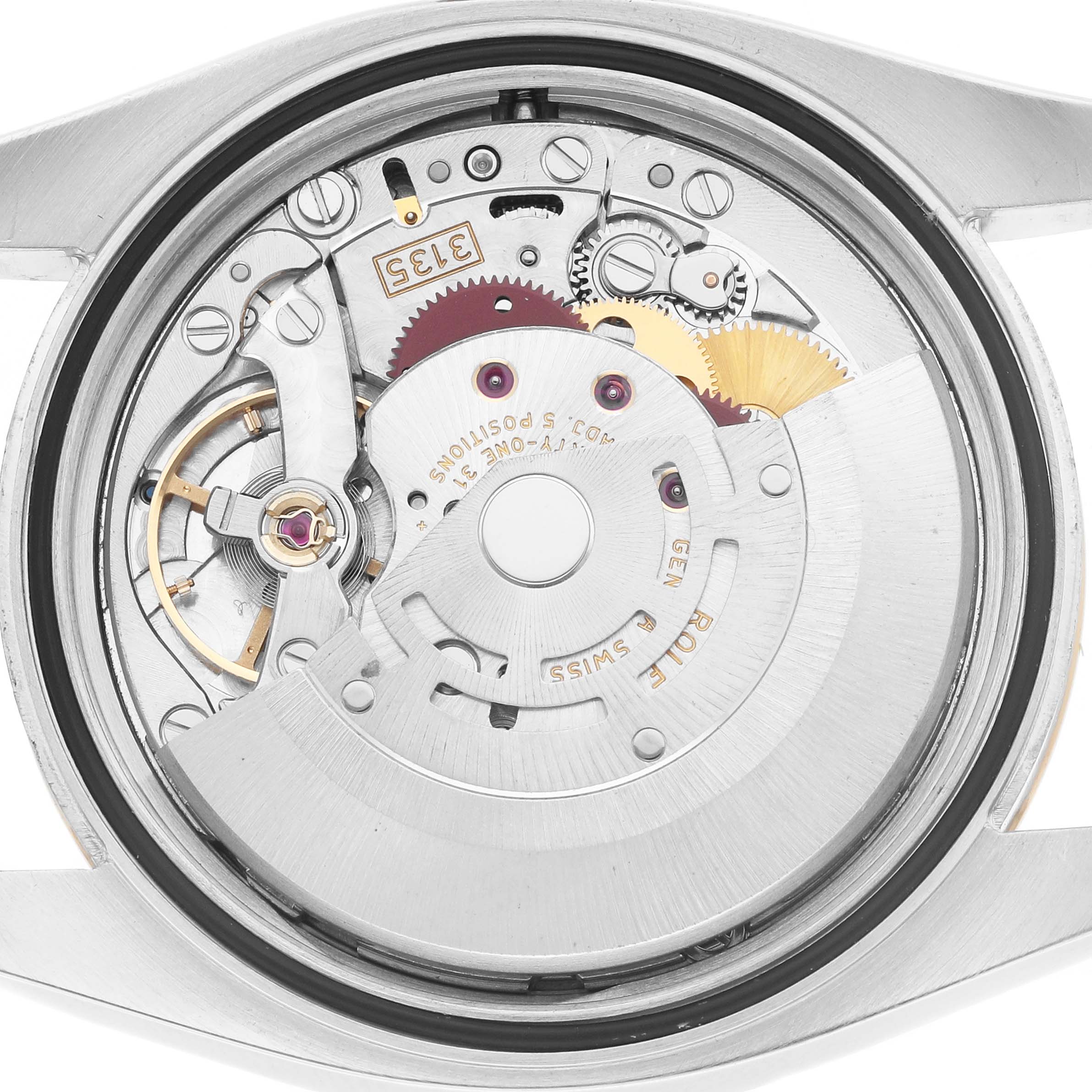 This is an internal view of a Rolex Datejust 116233 Men
s Steel and Gold (two tone) Champagne Dial, showing the movement and gears from the back.