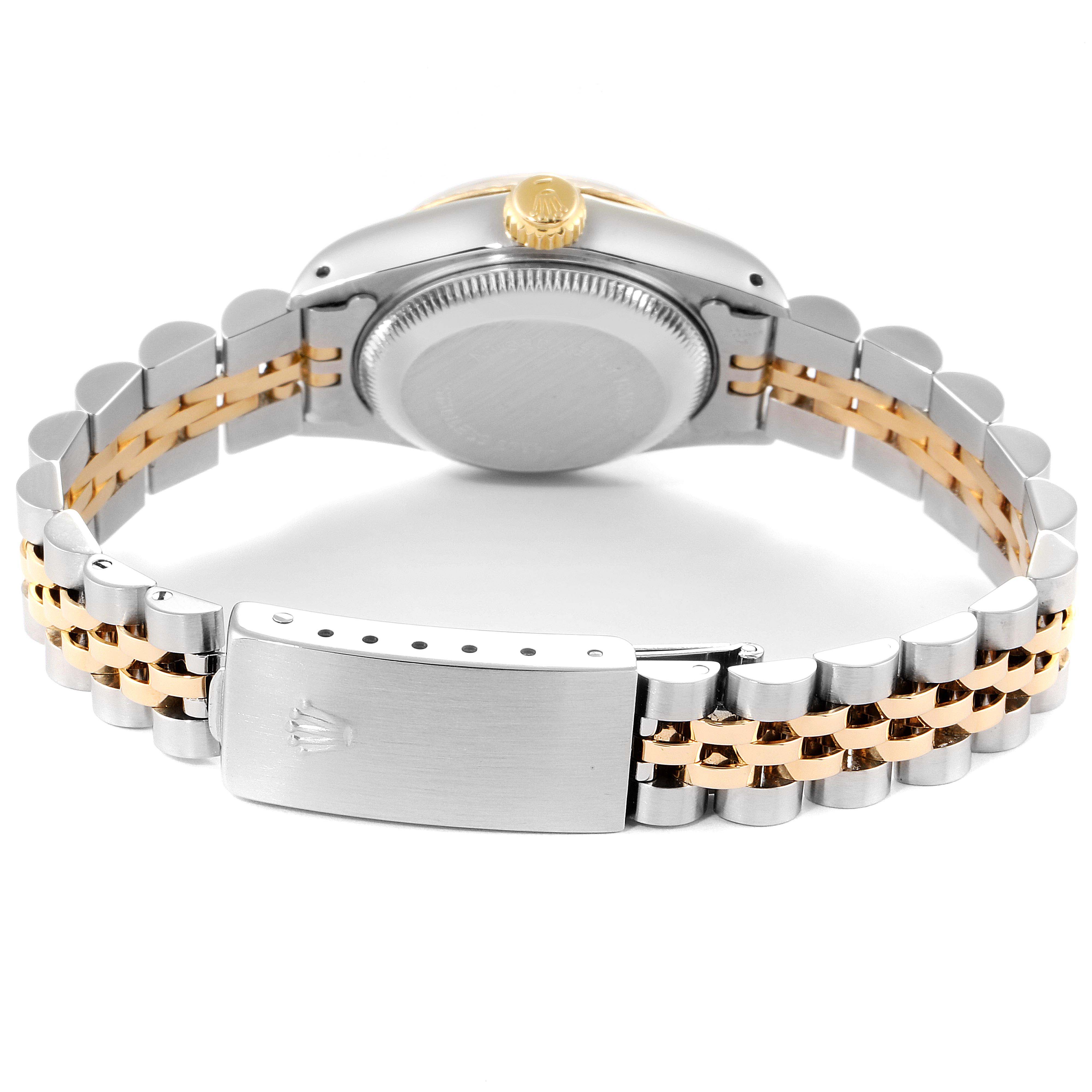 This image shows the back view of a Rolex Datejust 69173 Women
s Steel and Gold (two tone) Champagne Dial 69173 Women
s Steel and Gold (two tone) Champagne Dial watch, focusing on the case, crown, bracelet, and clasp.