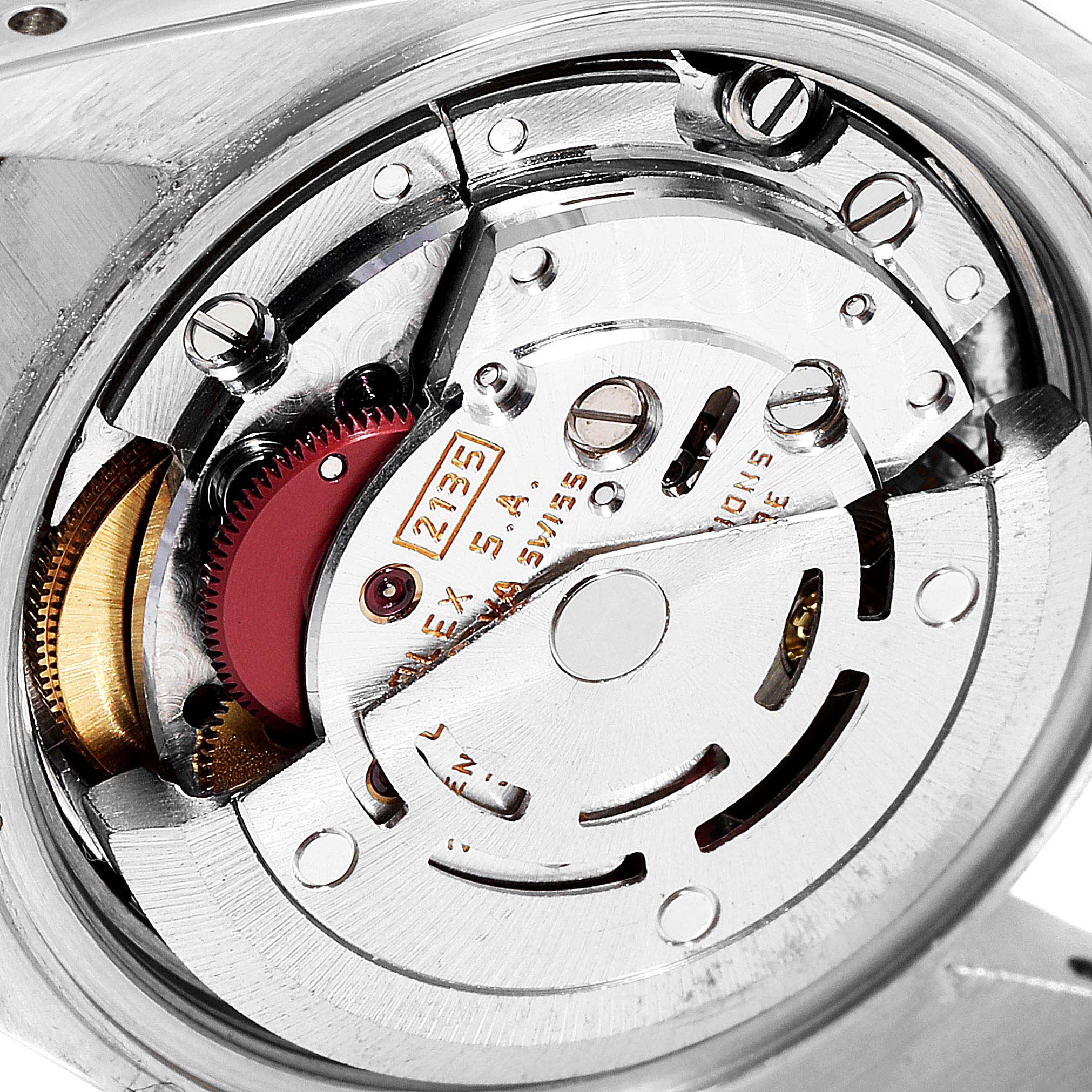 The image shows an internal view of the Rolex Datejust 69173 Women
s Steel and Gold (two tone) Champagne Dial 69173 Women
s Steel and Gold (two tone) Champagne Dial watch movement mechanism from an overhead angle.