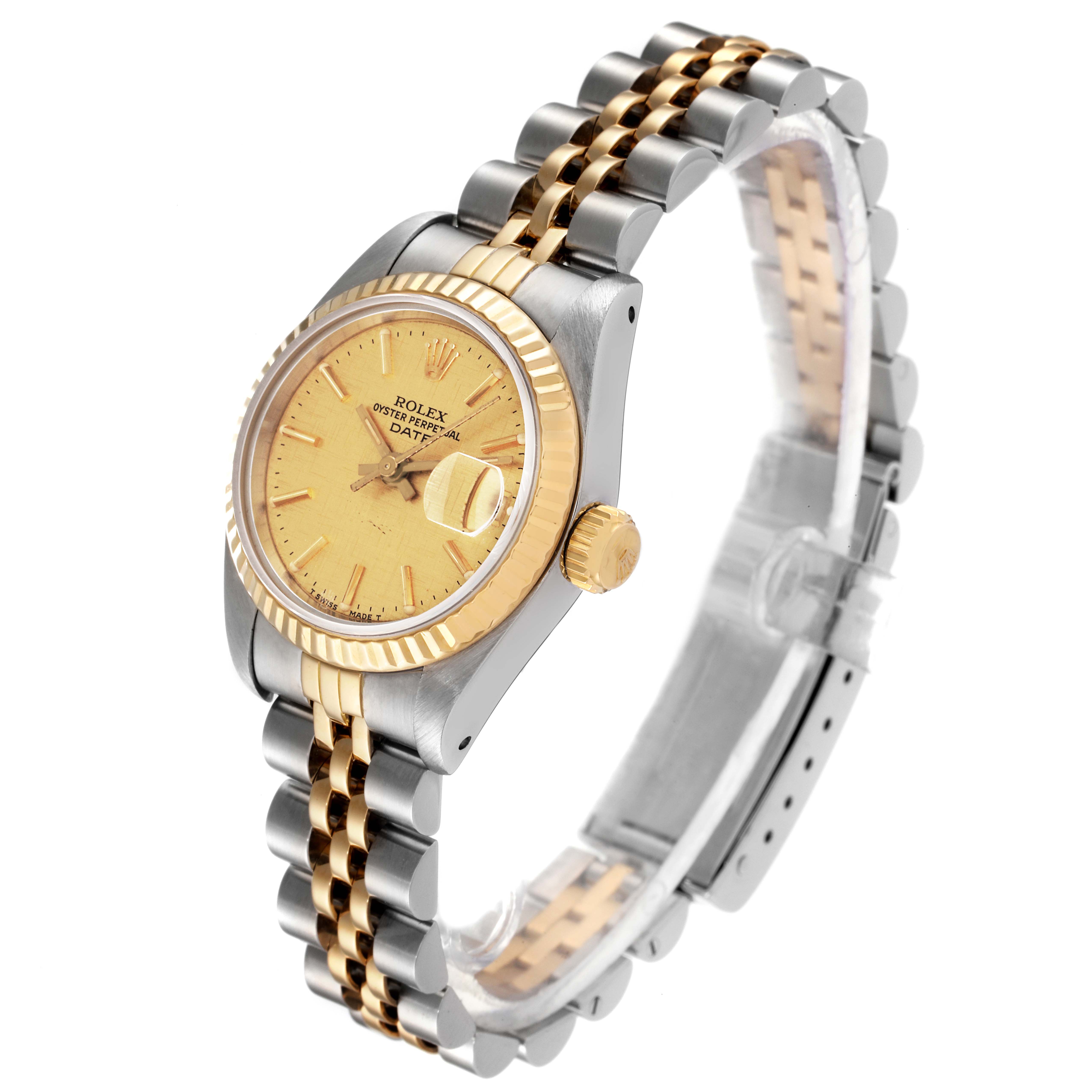 The Rolex Datejust 69173 Women's Steel and Gold (two tone) Champagne Dial 69173 Women's Steel and Gold (two tone) Champagne Dial watch is shown at a slight angle, highlighting the face, bezel, crown, and two-tone bracelet.