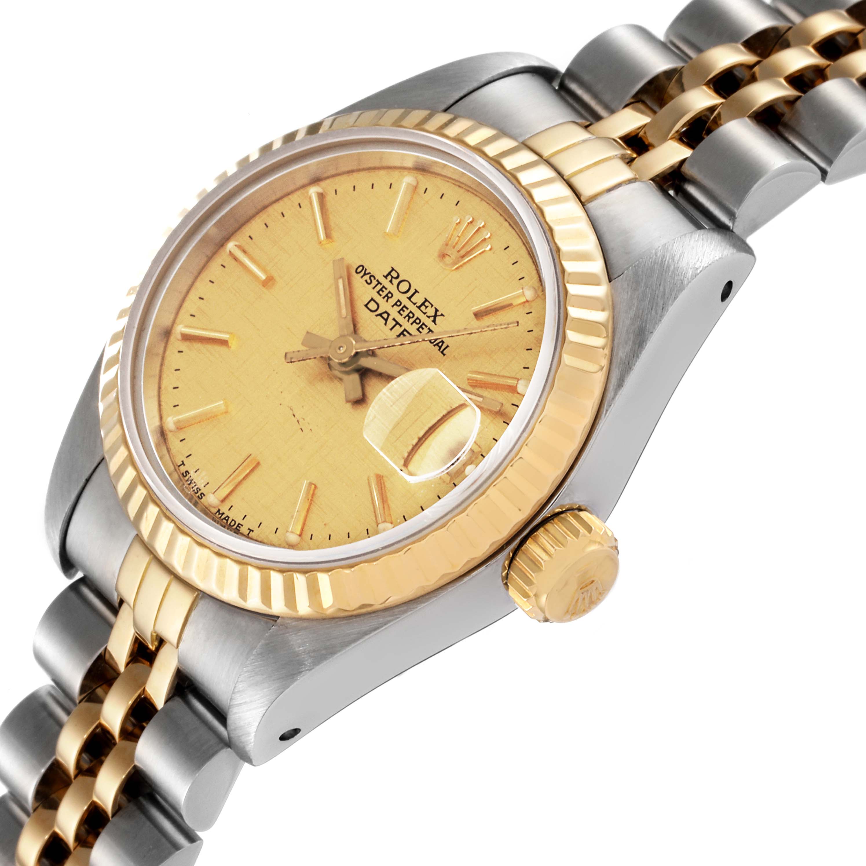 The Rolex Datejust 69173 Women's Steel and Gold (two tone) Champagne Dial 69173 Women's Steel and Gold (two tone) Champagne Dial watch is shown from an angled side view, highlighting the crown, bezel, and bracelet connection.
