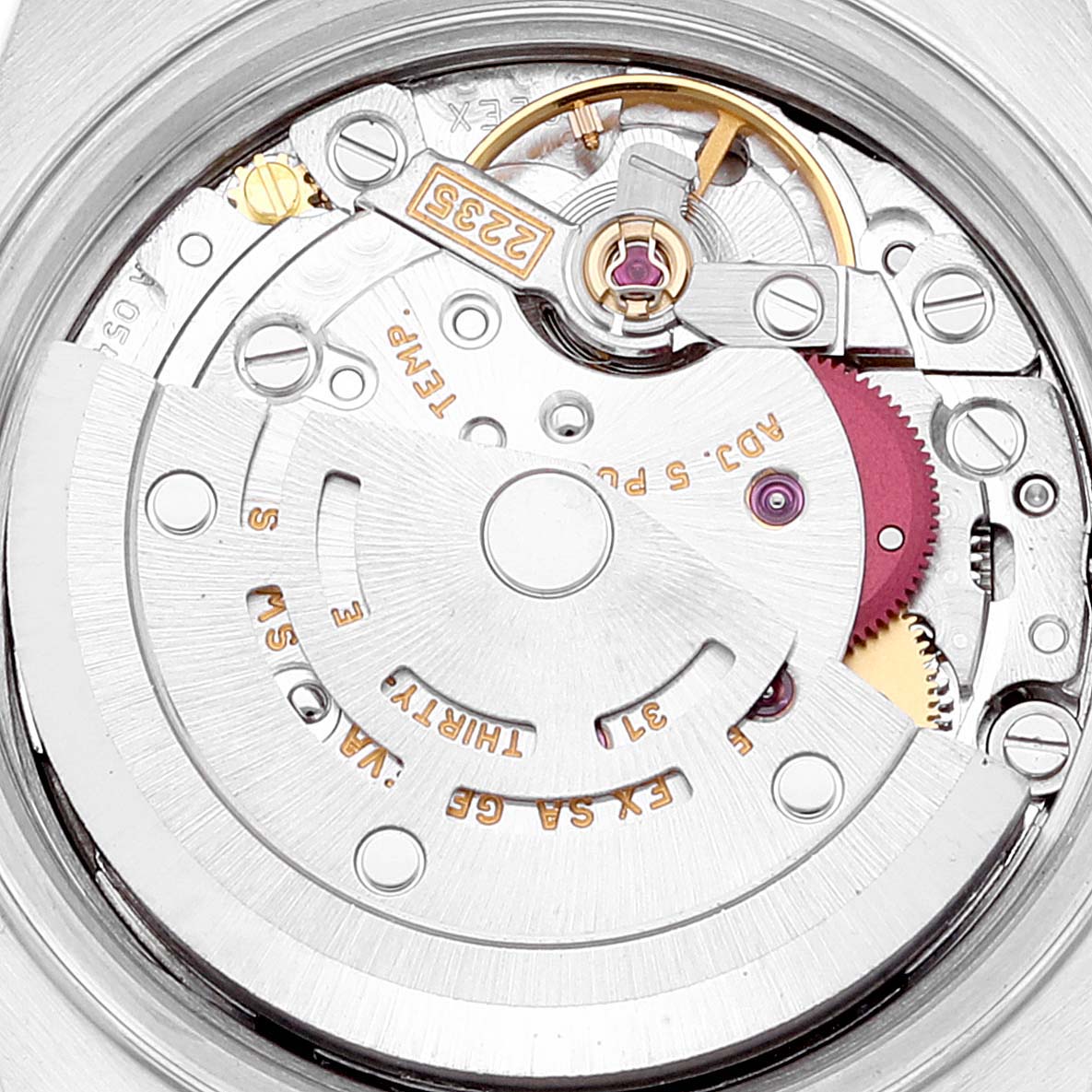 This image shows a close-up view of the movement mechanism of a Rolex Datejust 79163 Women's Steel and Gold (two tone) White Dial 79163 Women's Steel and Gold (two tone) White Dial watch.