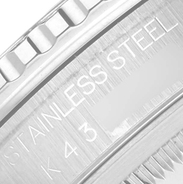 This close-up image shows the side of the bezel and part of the case back with "STAINLESS STEEL" engraved on the Rolex Turn-o-Graph 16264 Men
s Stainless Steel Black Dial 16264 Men
s Stainless Steel Black Dial model.