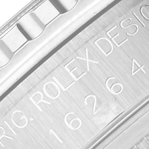 The image shows a close-up of the engraved text on the case back of a Rolex Turn-o-Graph 16264 Men
s Stainless Steel Black Dial 16264 Men
s Stainless Steel Black Dial watch.