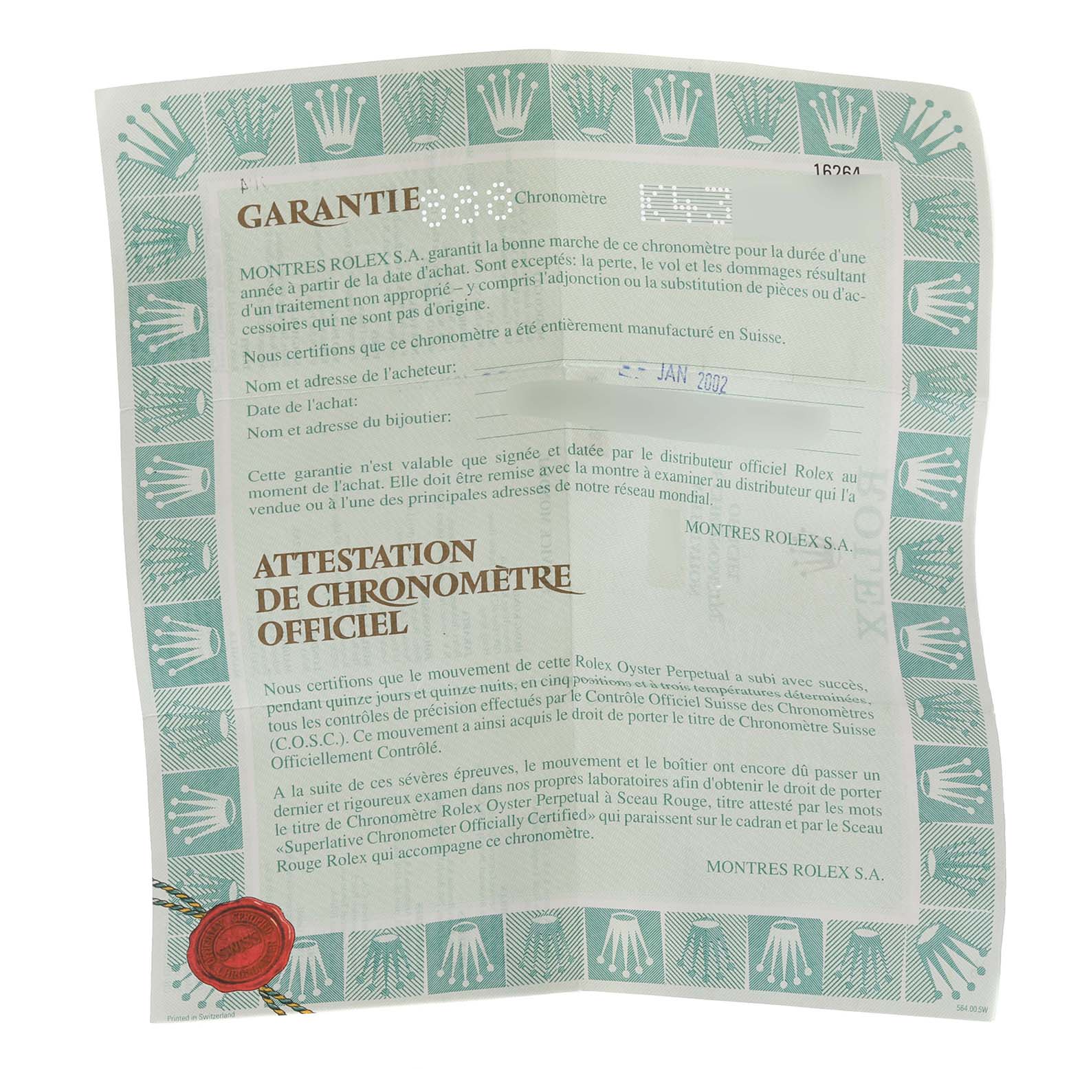 The image shows the warranty and official chronometer certification for the Rolex Turn-o-Graph 16264 Men
s Stainless Steel Black Dial 16264 Men
s Stainless Steel Black Dial model, with text in French and a red seal.