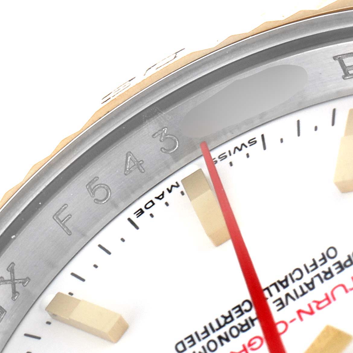 The image shows a close-up of the bezel, red hand, and part of the dial of a Rolex Turn-o-Graph 116263 Men's Steel and Gold (two tone) White Dial 116263 Men's Steel and Gold (two tone) White Dial watch.