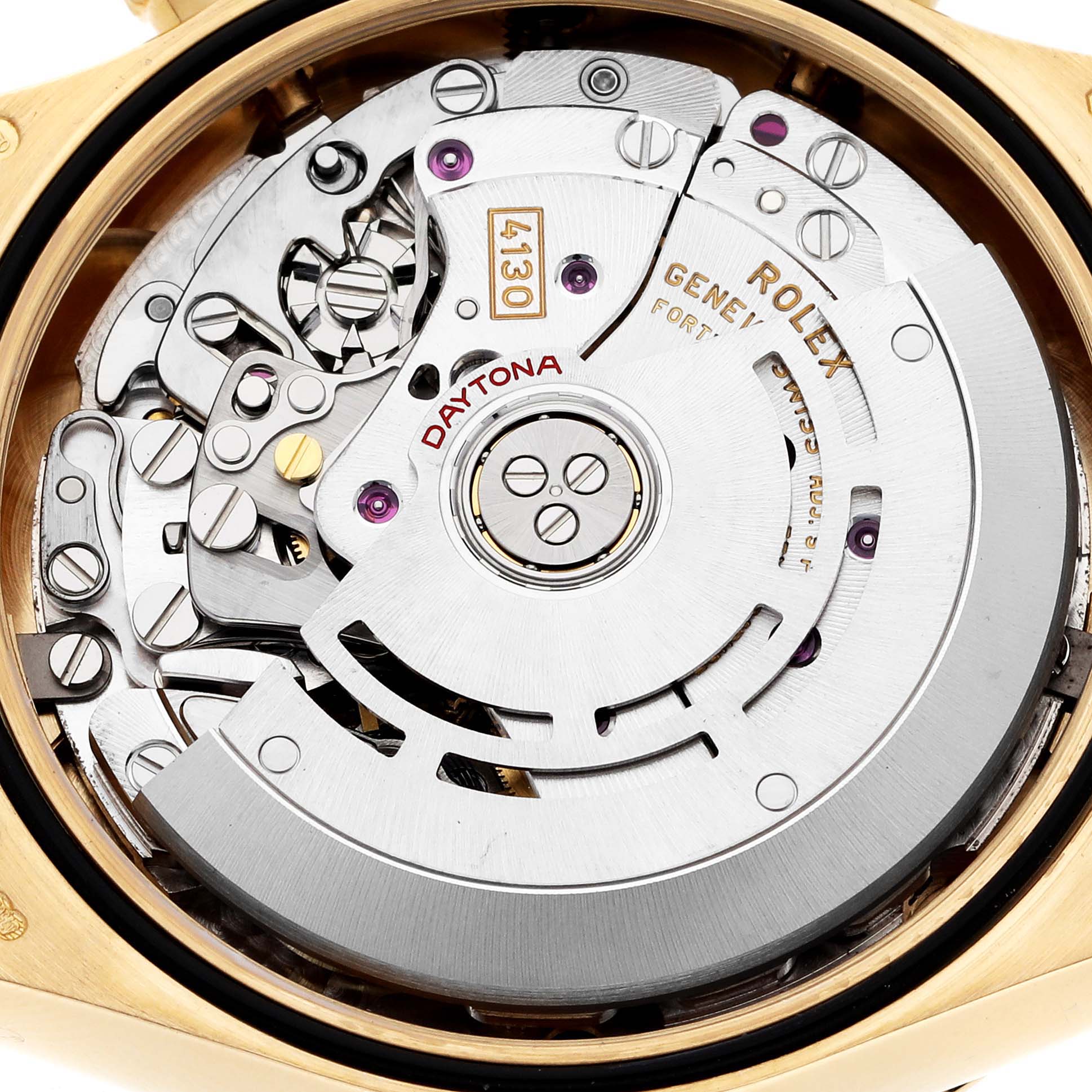 This is an image of the internal movement of a Rolex Daytona 116508 Men's Yellow Gold Green Dial 116508 Men's Yellow Gold Green Dial watch, showing gears, screws, and mechanical details.