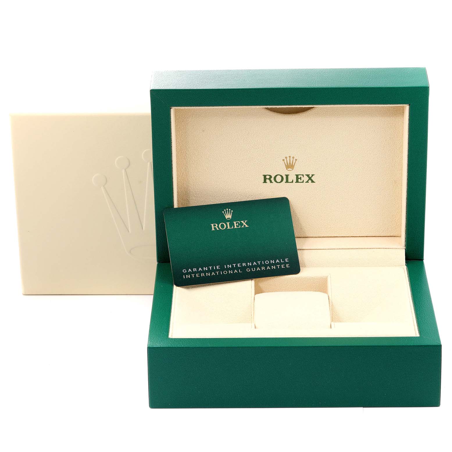 This image shows the open packaging for a Rolex Explorer 226570 Men's Stainless Steel Black Dial 226570 Men's Stainless Steel Black Dial model watch, including its green box, cushion slot, and guarantee card.