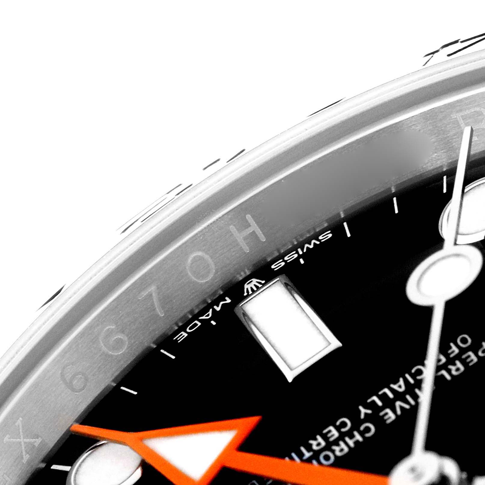 The close-up photo shows a partial view of the dial, bezel, and hands of a Rolex Explorer 226570 Men's Stainless Steel Black Dial 226570 Men's Stainless Steel Black Dial watch.