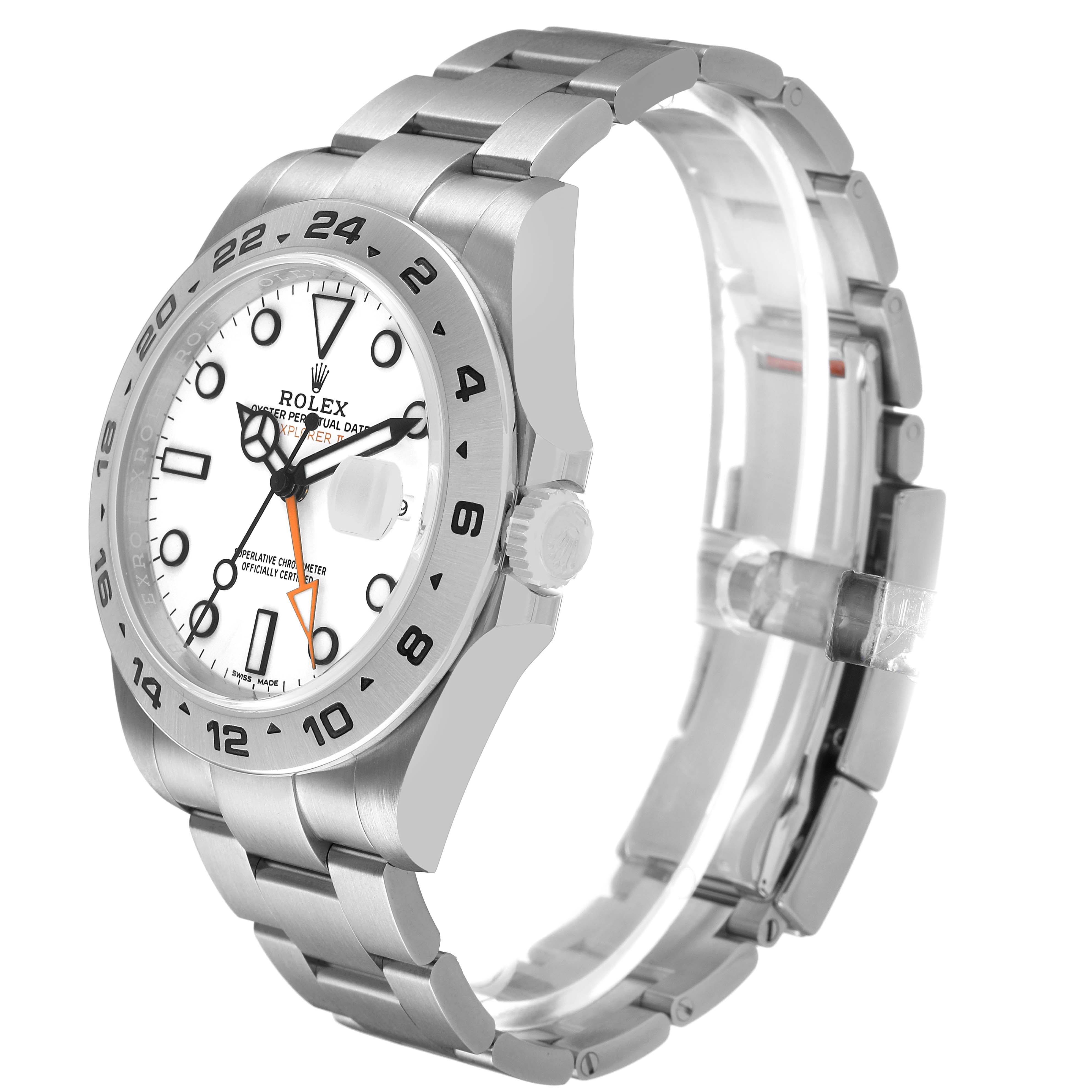 The Rolex Explorer 216570 Men's Stainless Steel White Dial watch is shown at a three-quarter angle, highlighting the face, bezel, and bracelet.