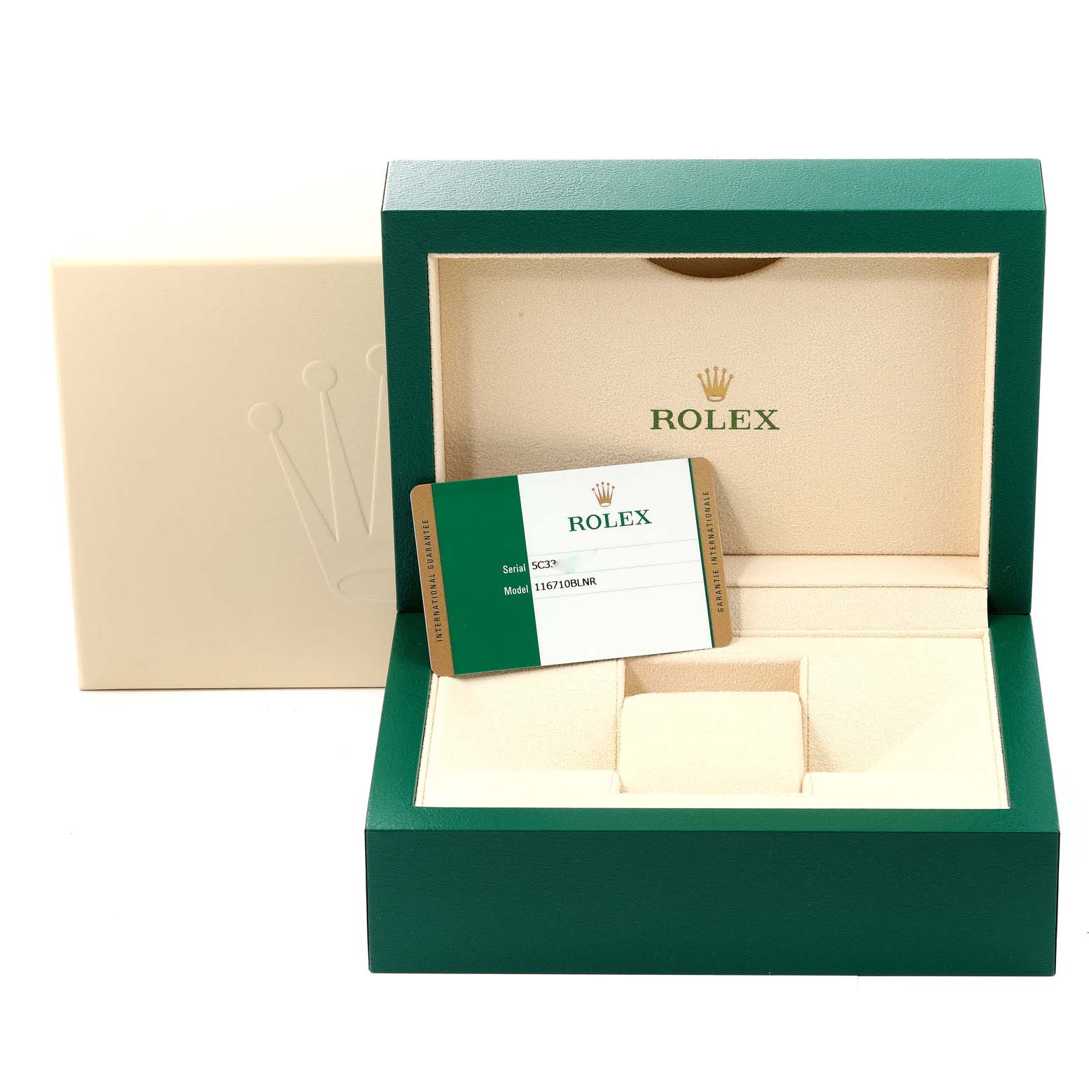 The image shows a green and beige Rolex watch box and a card for the GMT-Master model by Rolex.