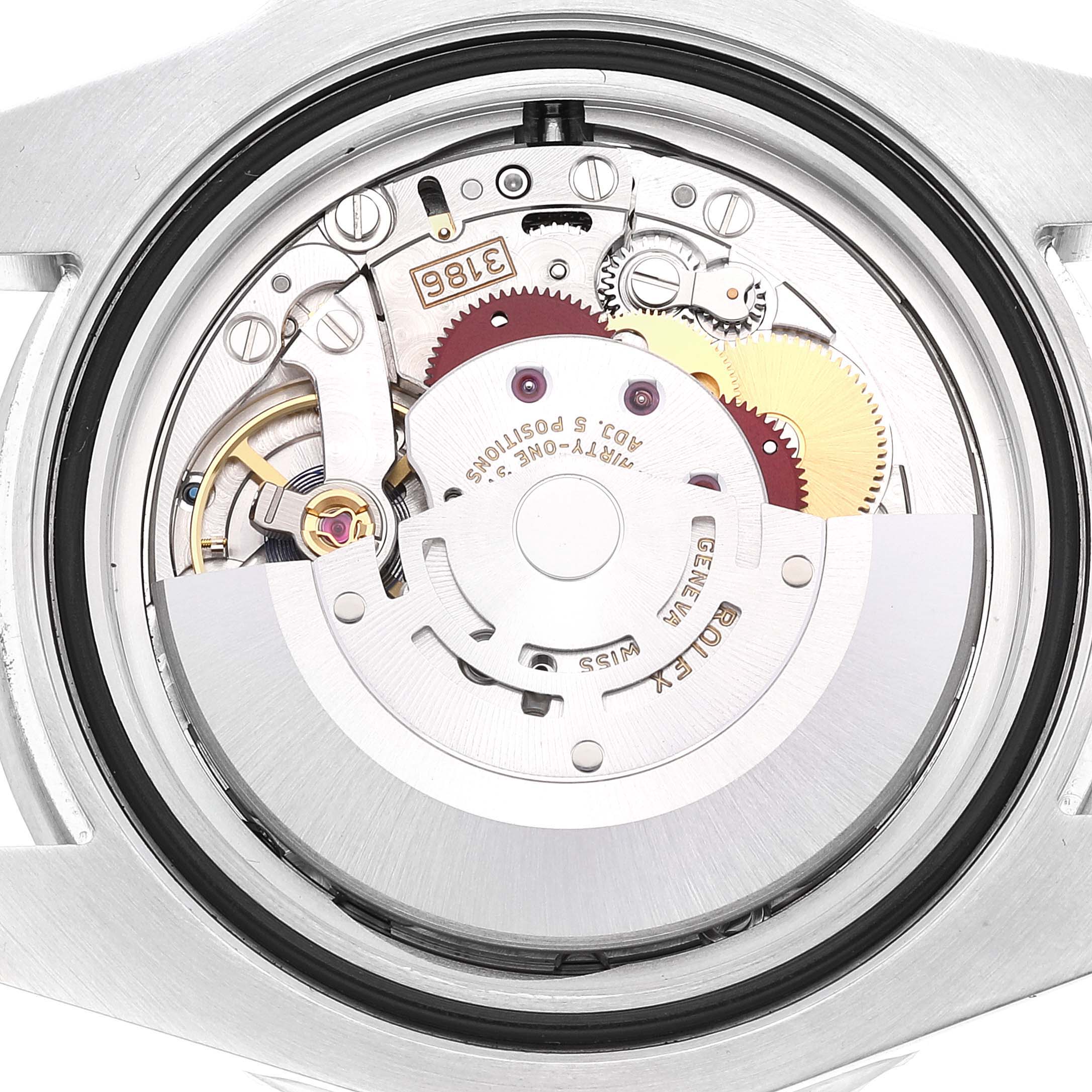 The image shows the internal mechanism of a Rolex GMT-Master 116710 Men's Stainless Steel Black Dial 116710 Men's Stainless Steel Black Dial watch from a back view, displaying gears and intricate parts.