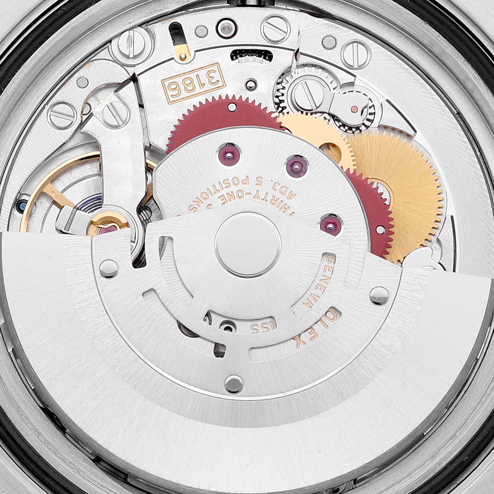 This image shows a macro view of the movement mechanism inside a Rolex GMT-Master 116710 Men's Stainless Steel Black Dial 116710 Men's Stainless Steel Black Dial watch.