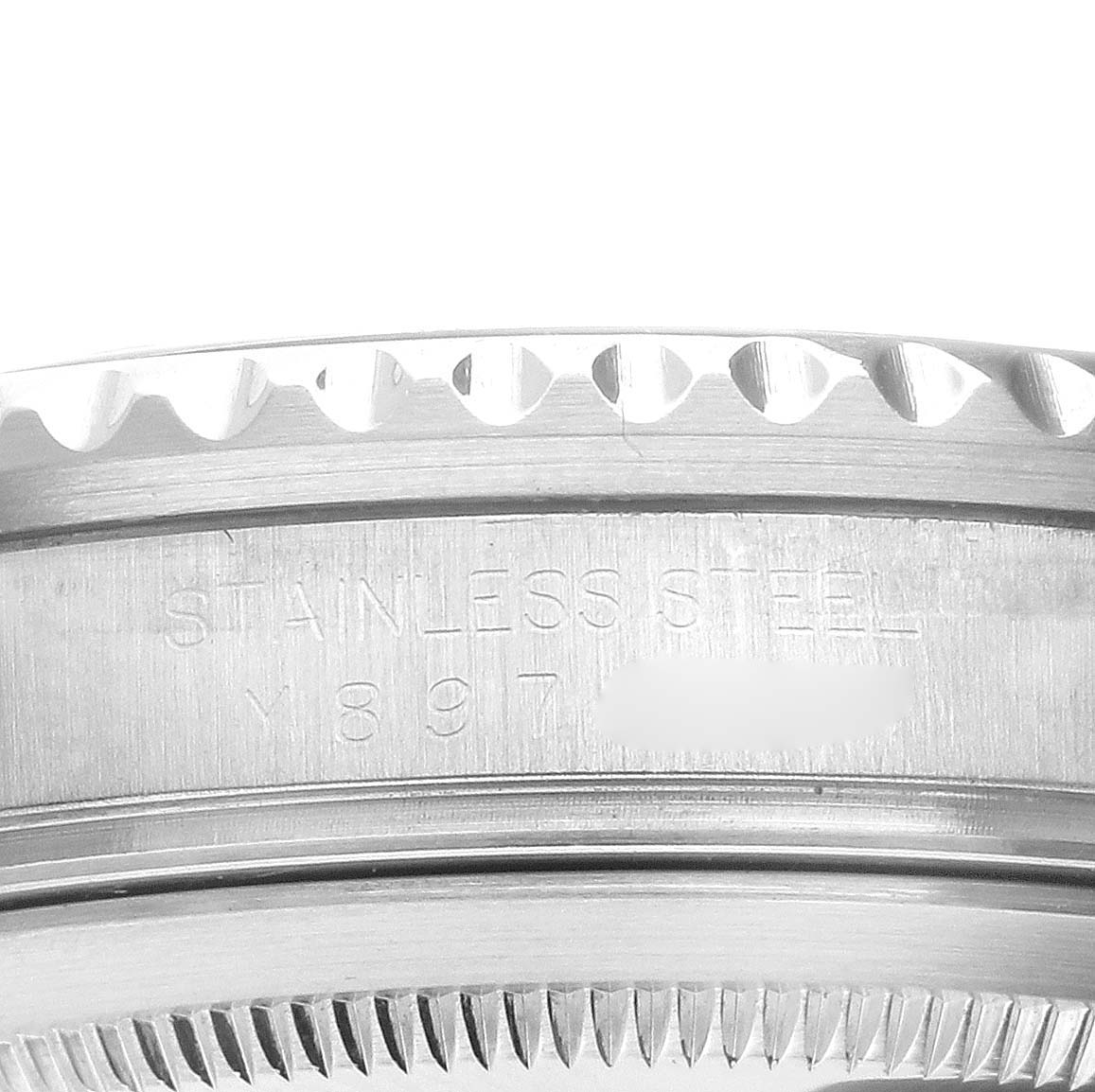 This image shows a close-up of the bezel and case edge of a Rolex GMT-Master 16710 Men's Stainless Steel Black Dial 16710 Men's Stainless Steel Black Dial watch in stainless steel.