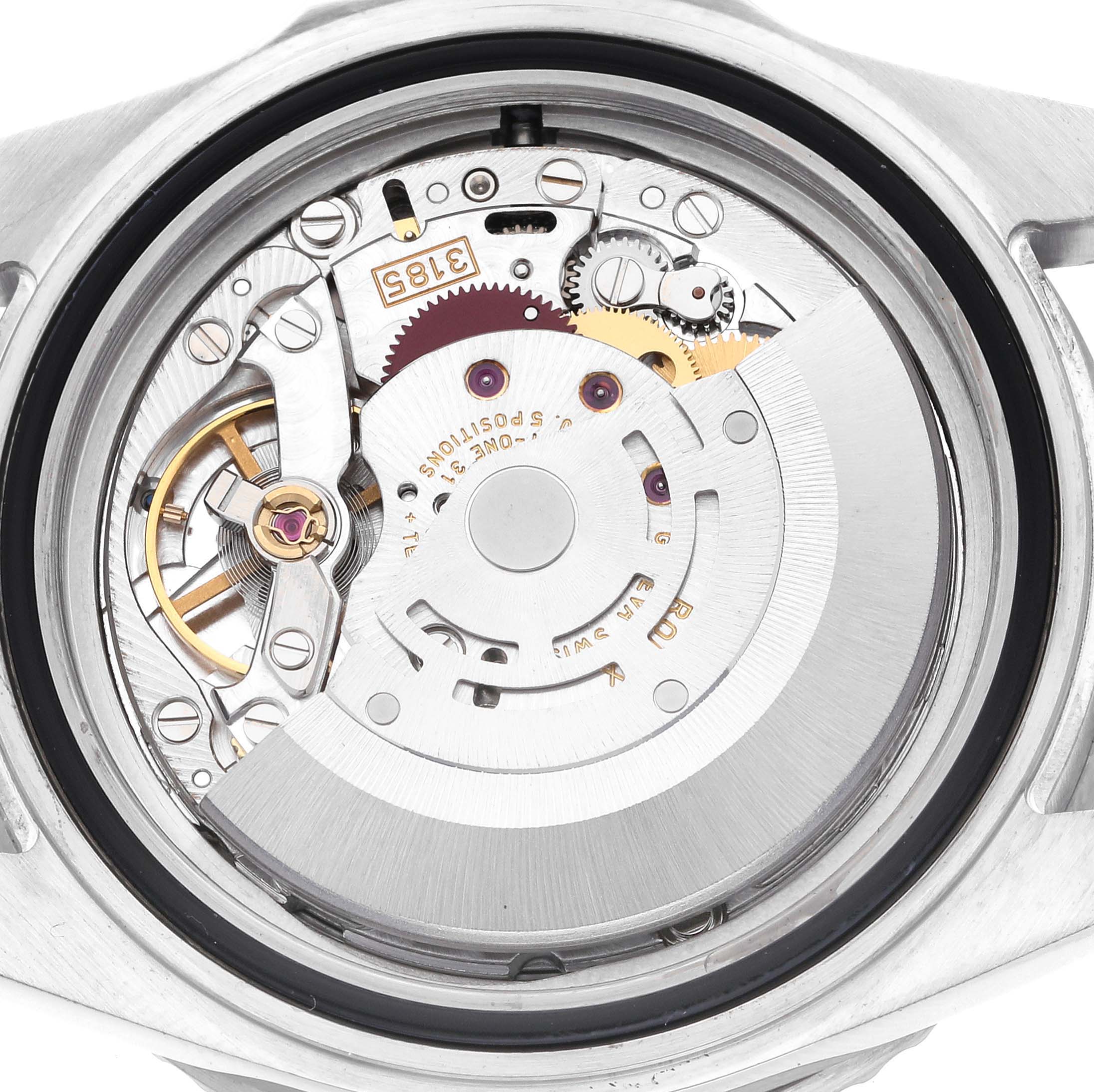 The image shows the back view of the Rolex GMT-Master 16710 Men's Stainless Steel Black Dial 16710 Men's Stainless Steel Black Dial watch, highlighting its intricate internal mechanism and movement components.