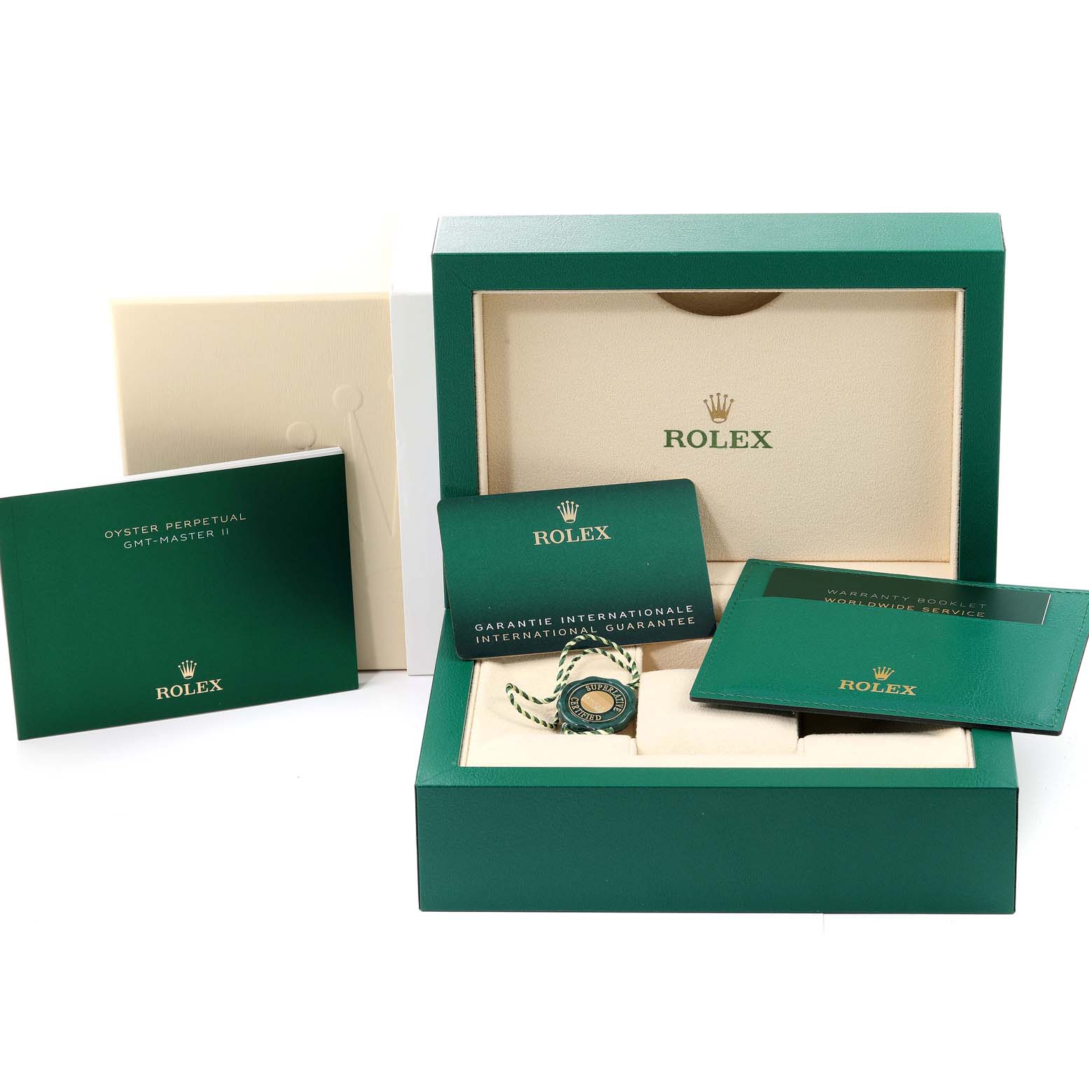 The image shows packaging and accessories for a Rolex GMT-Master 126710 Men
s Stainless Steel Black Dial 126710 Men
s Stainless Steel Black Dial II watch, including the box, warranty cards, and brochures.