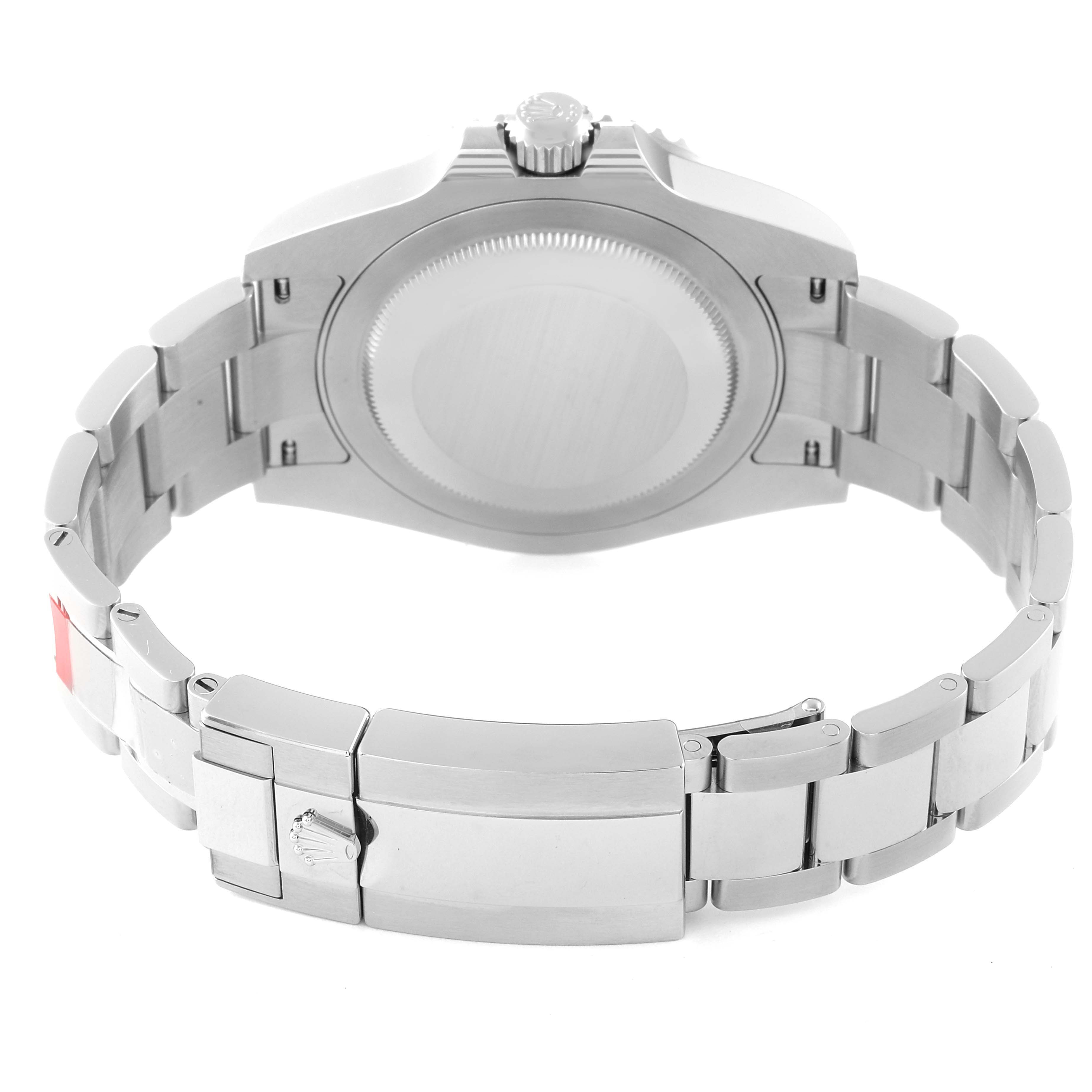 This Rolex GMT-Master 126710 Men
s Stainless Steel Black Dial 126710 Men
s Stainless Steel Black Dial watch is shown from the back, displaying its case, crown, and bracelet.