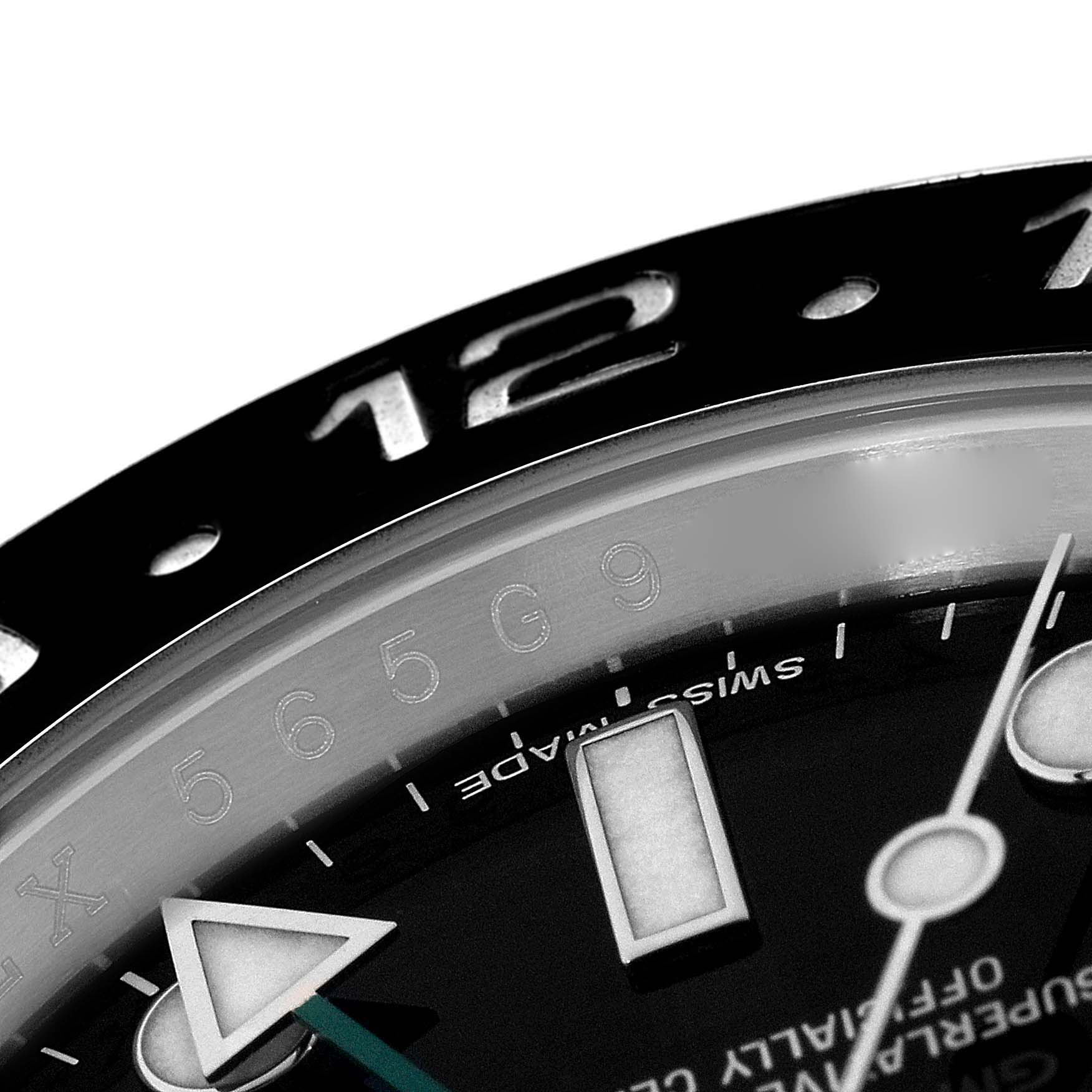The image shows a close-up of the bezel, part of the dial, hour markers, and hands of a Rolex GMT-Master 116710 Men's Stainless Steel Black Dial 116710 Men's Stainless Steel Black Dial watch.