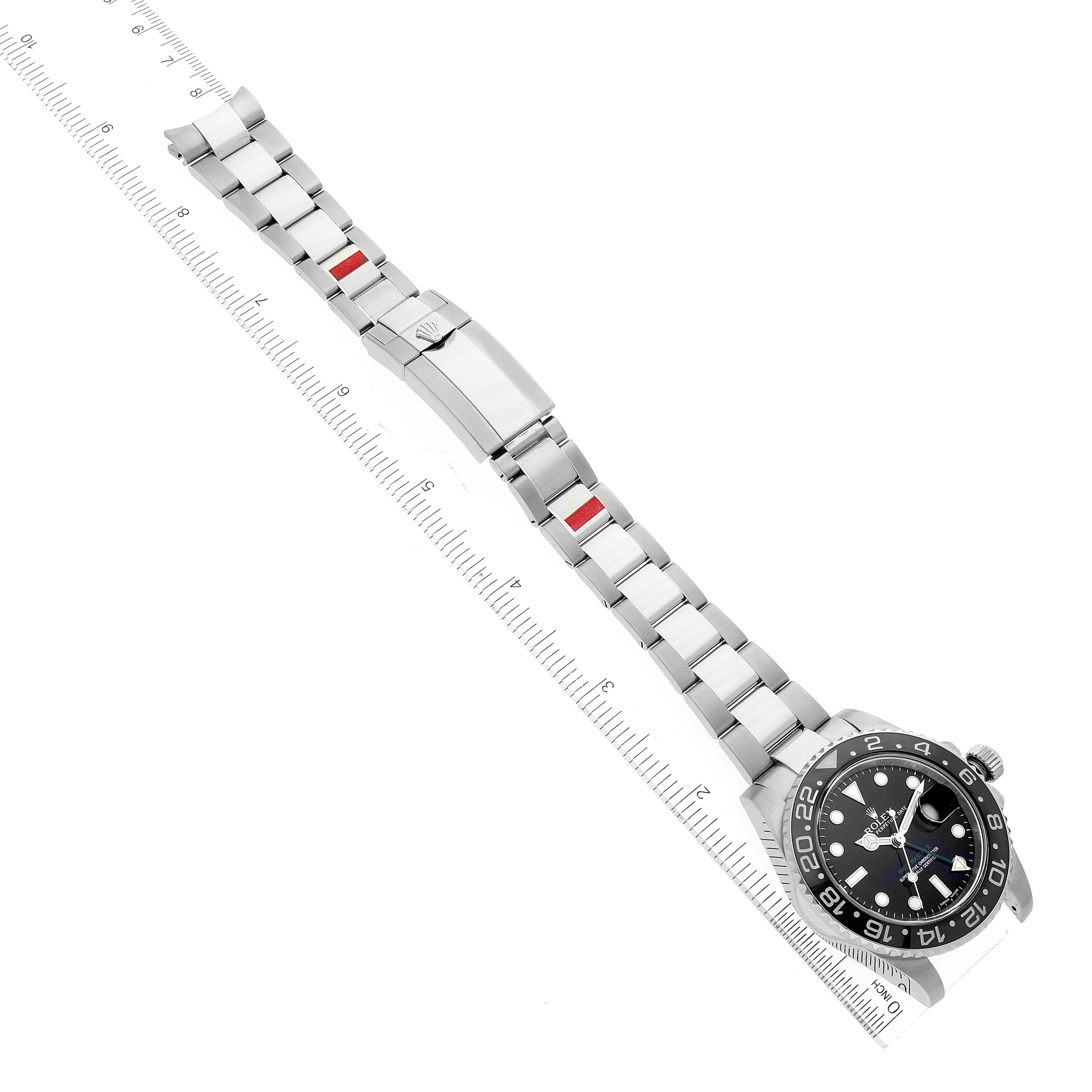 This image shows a Rolex GMT-Master 116710 Men's Stainless Steel Black Dial 116710 Men's Stainless Steel Black Dial watch, displaying its face, bezel, and stainless steel bracelet from a top-down angle.