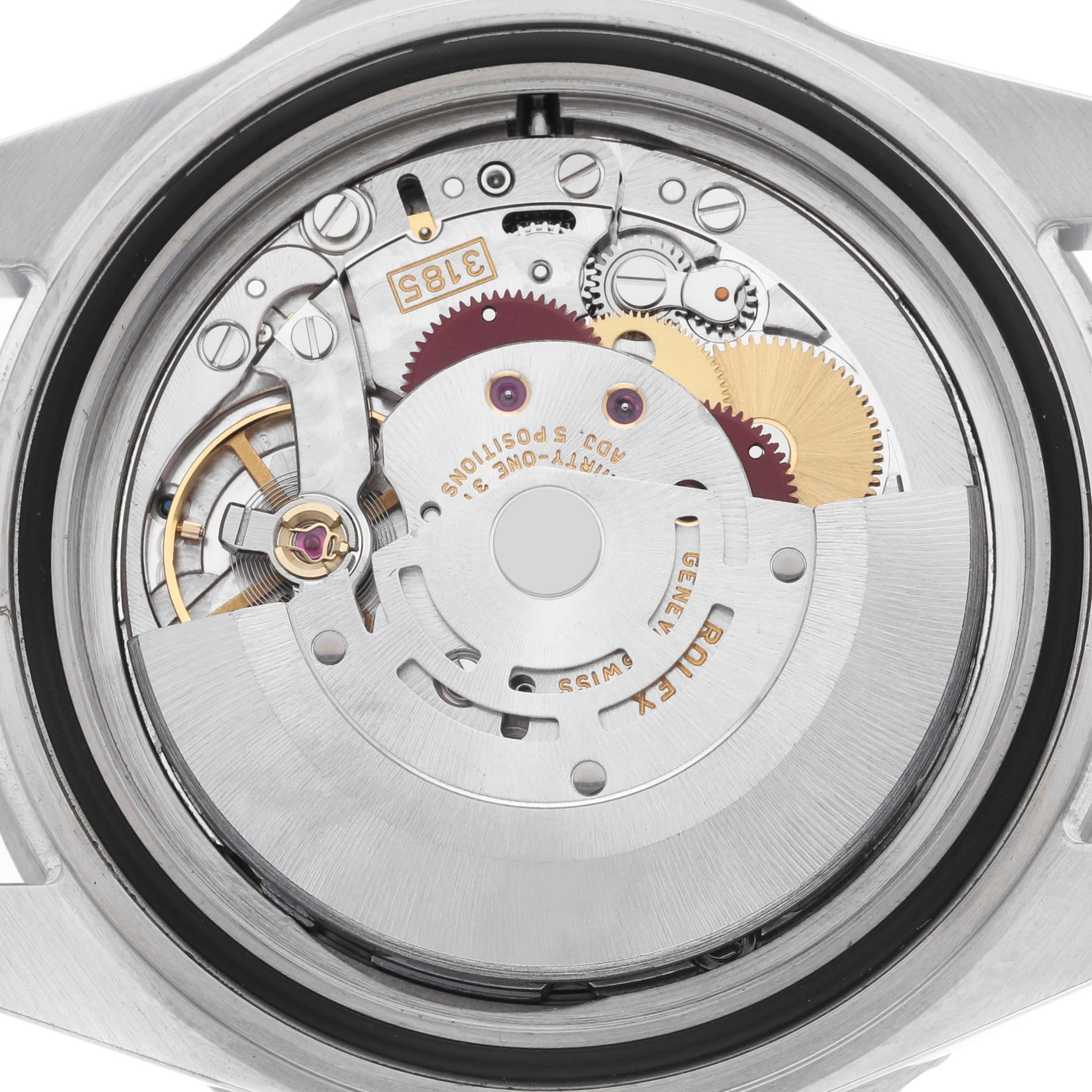 The image shows the movement and internal mechanism of a Rolex GMT-Master 16710 Men
s Stainless Steel Black Dial watch from the rear angle.