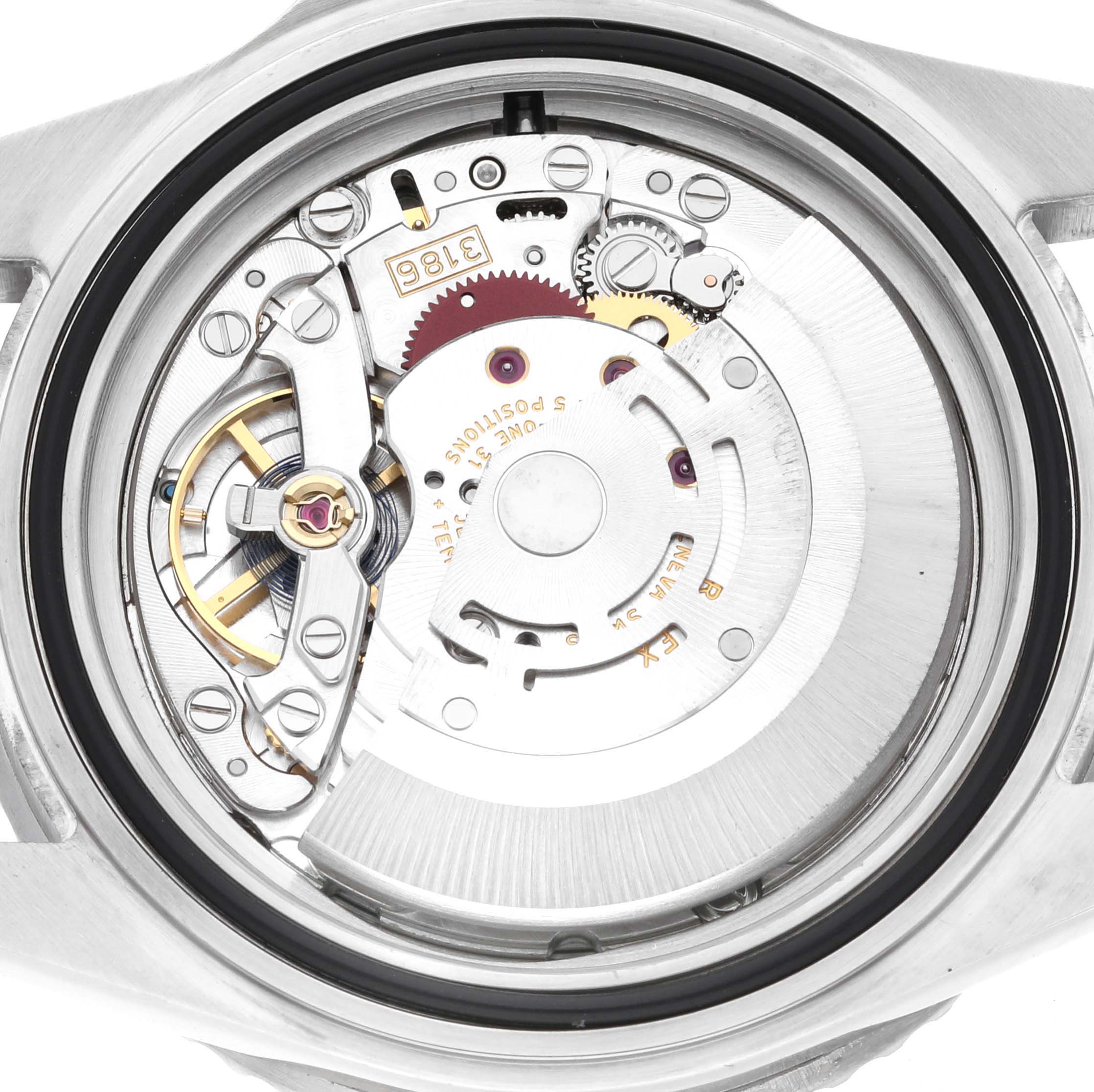 The image shows the inner mechanics and movement of a Rolex GMT-Master 16710 Men's Stainless Steel Black Dial 16710 Men's Stainless Steel Black Dial watch from a rear angle with the case back removed.