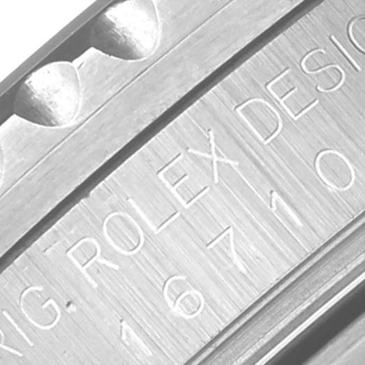 The image shows a close-up of the case side of a Rolex GMT-Master 16710 Men's Stainless Steel Black Dial 16710 Men's Stainless Steel Black Dial watch with engraving details visible.