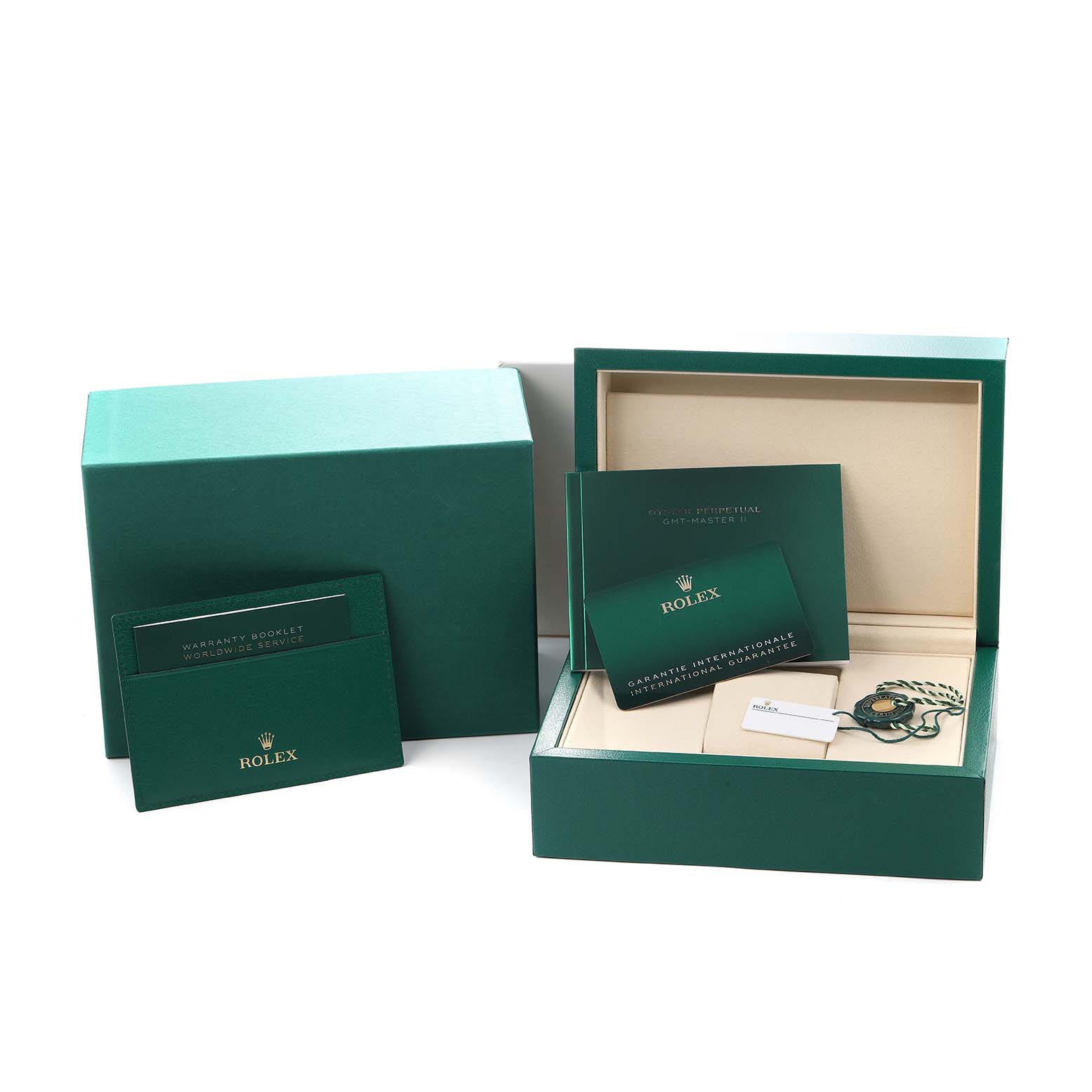 The image shows packaging and accessories for a Rolex GMT-Master 126711 Men
s Steel and Gold (two tone) Black Dial, including a box, warranty booklet, and certificate.