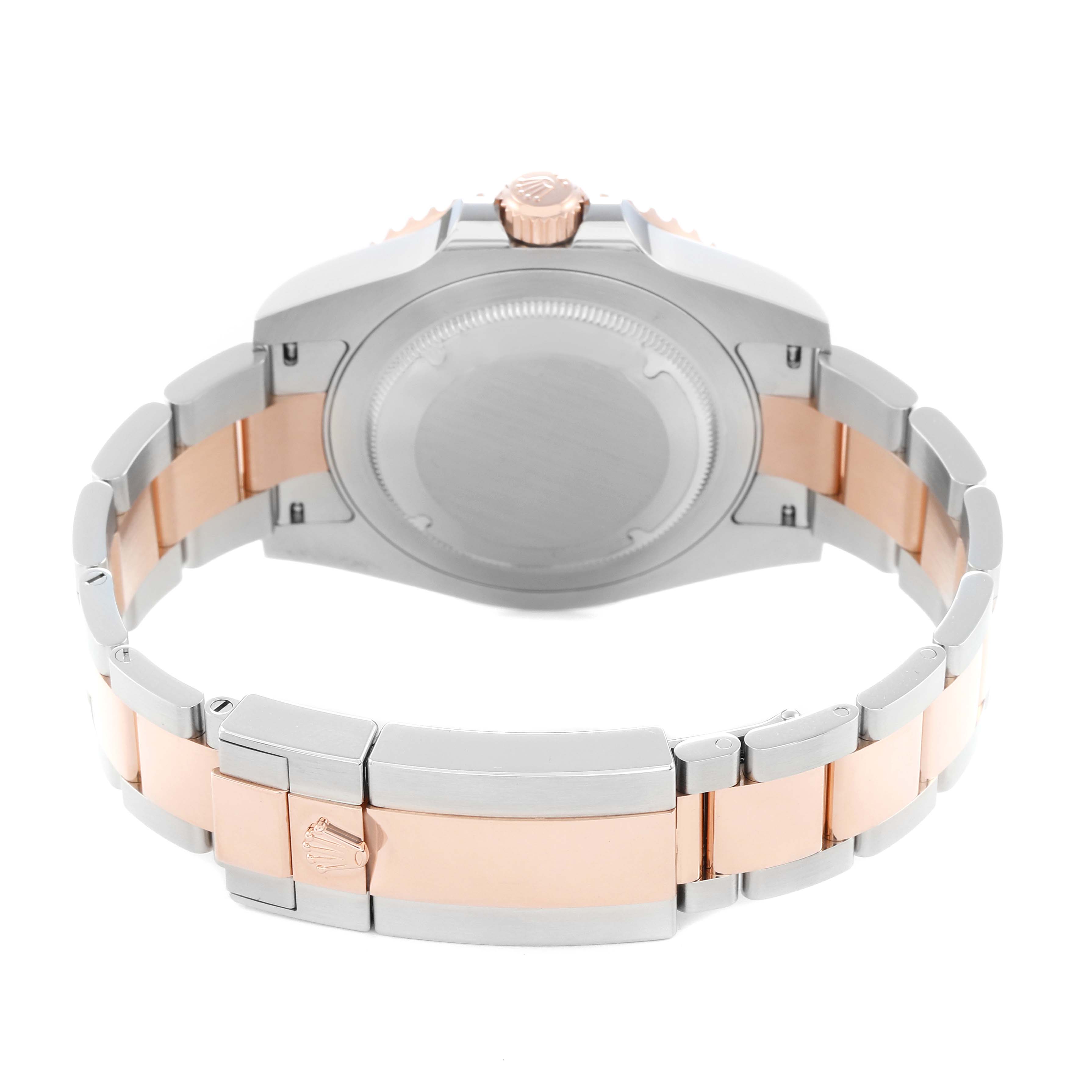 The image shows the back case and bracelet of a Rolex GMT-Master 126711 Men
s Steel and Gold (two tone) Black Dial watch from the rear angle.