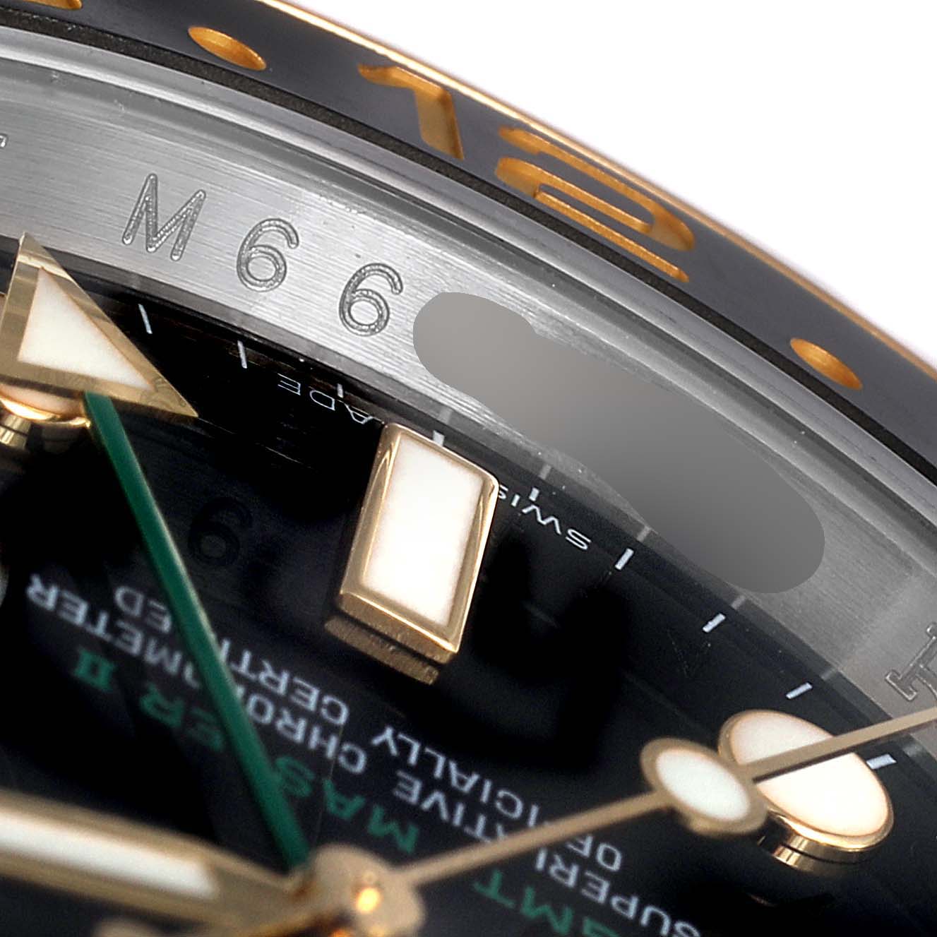 This close-up angle shows the dial, hands, and part of the bezel of the Rolex GMT-Master 116713 Men's Steel and Gold (two tone) Black Dial 116713 Men's Steel and Gold (two tone) Black Dial watch.