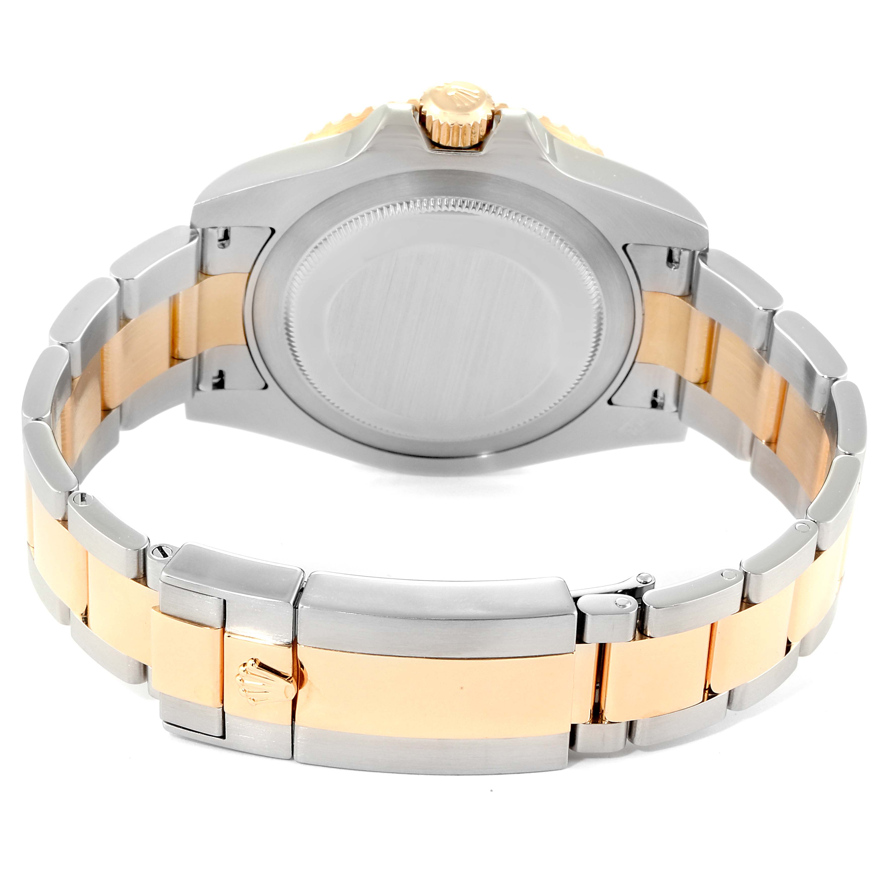 This image shows the back view of a Rolex GMT-Master 116713 Men's Steel and Gold (two tone) Black Dial 116713 Men's Steel and Gold (two tone) Black Dial watch, focusing on the case back and bicolor bracelet with the clasp.