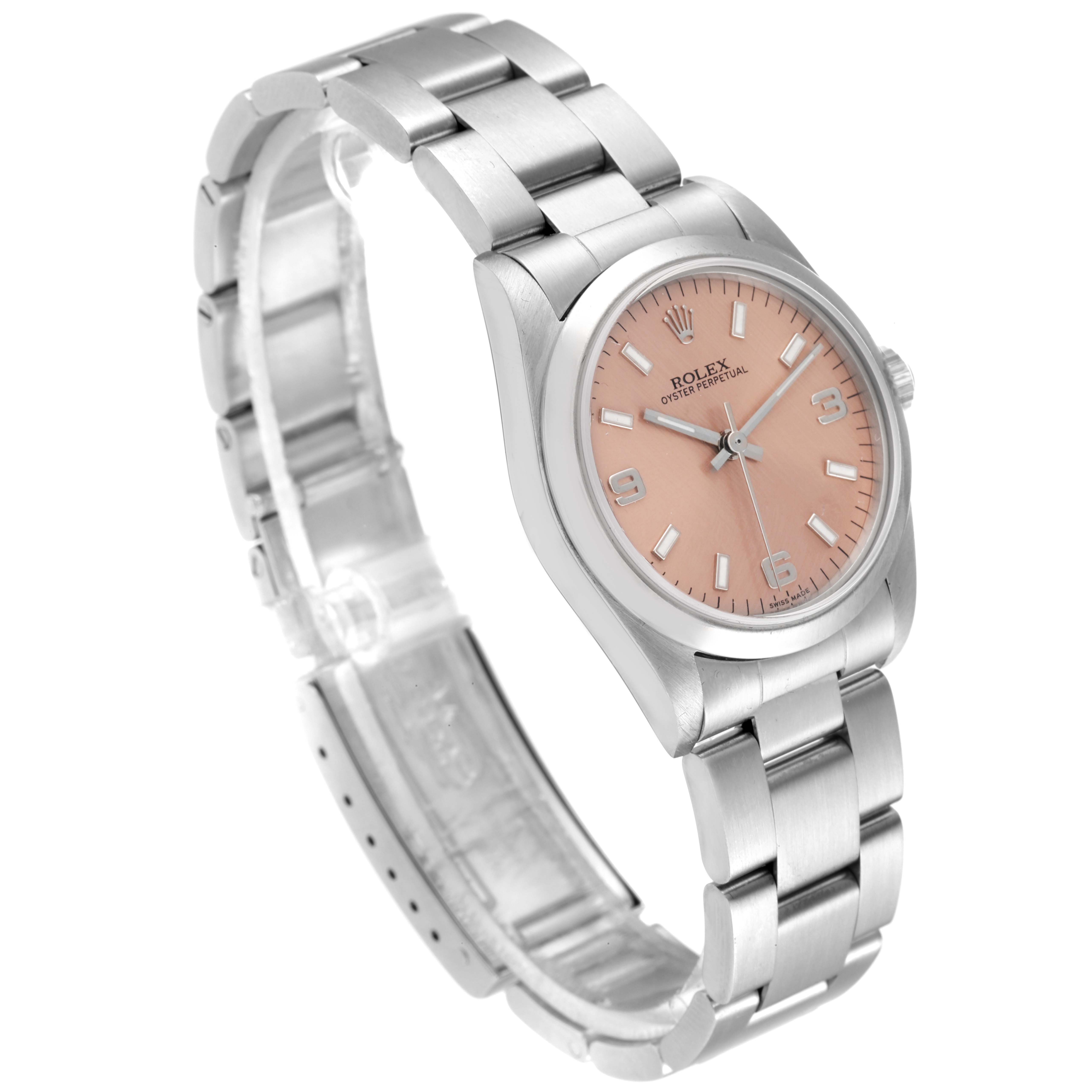 The image shows a side view of a Rolex Mid-Size 77080 Women's Stainless Steel Pink Dial 77080 Women's Stainless Steel Pink Dial Oyster Perpetual watch, highlighting the dial, bracelet, and clasp.