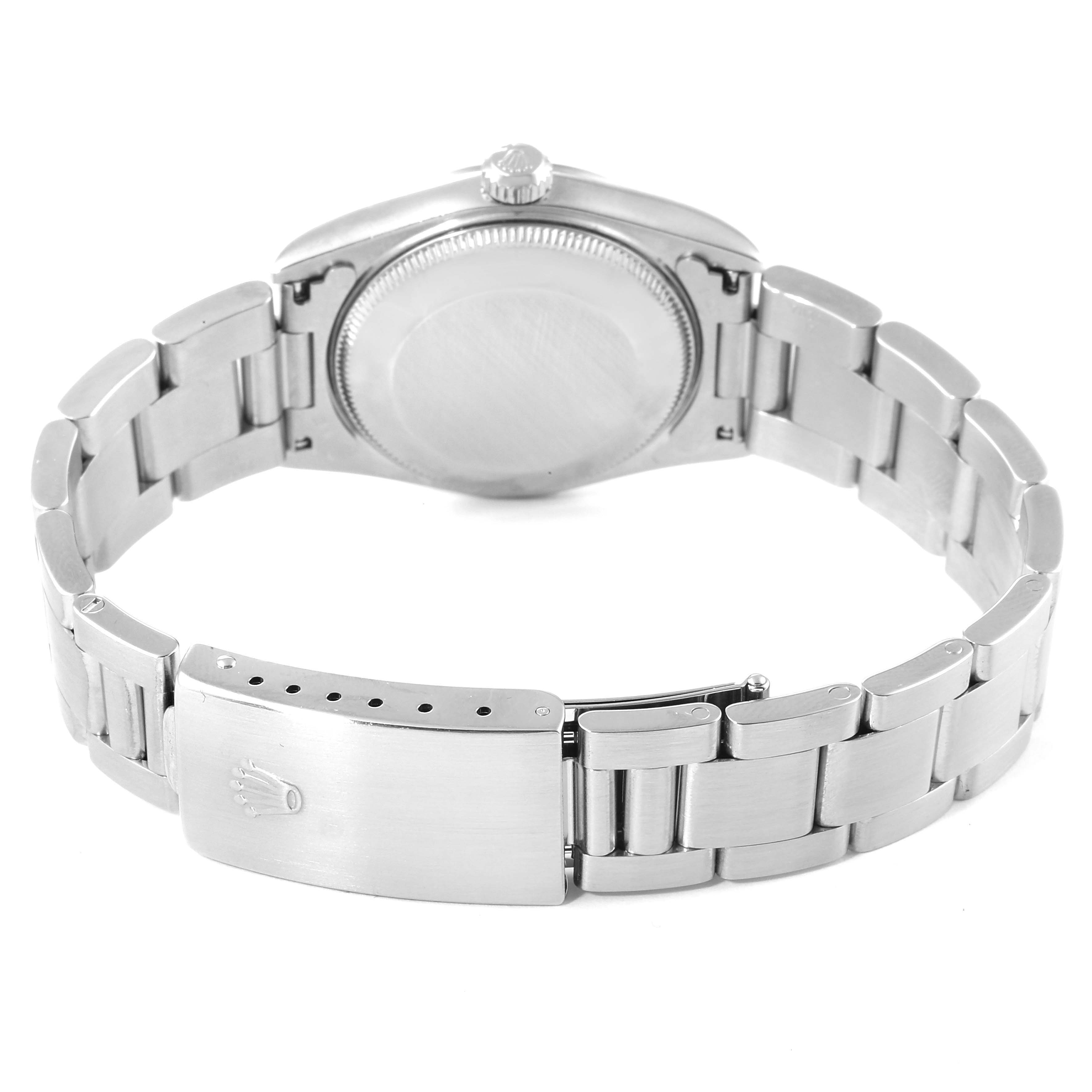 The image shows the back view of a Rolex Mid-Size 77080 Women's Stainless Steel Pink Dial 77080 Women's Stainless Steel Pink Dial model watch, highlighting its oyster bracelet and closed clasp.