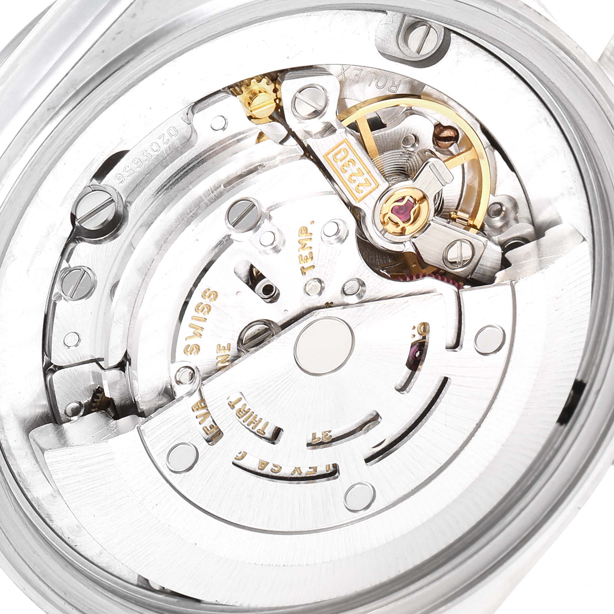 The image shows the internal mechanism of a Rolex Mid-Size 77080 Women's Stainless Steel Pink Dial 77080 Women's Stainless Steel Pink Dial watch from a top-down angle, focusing on the movement components.