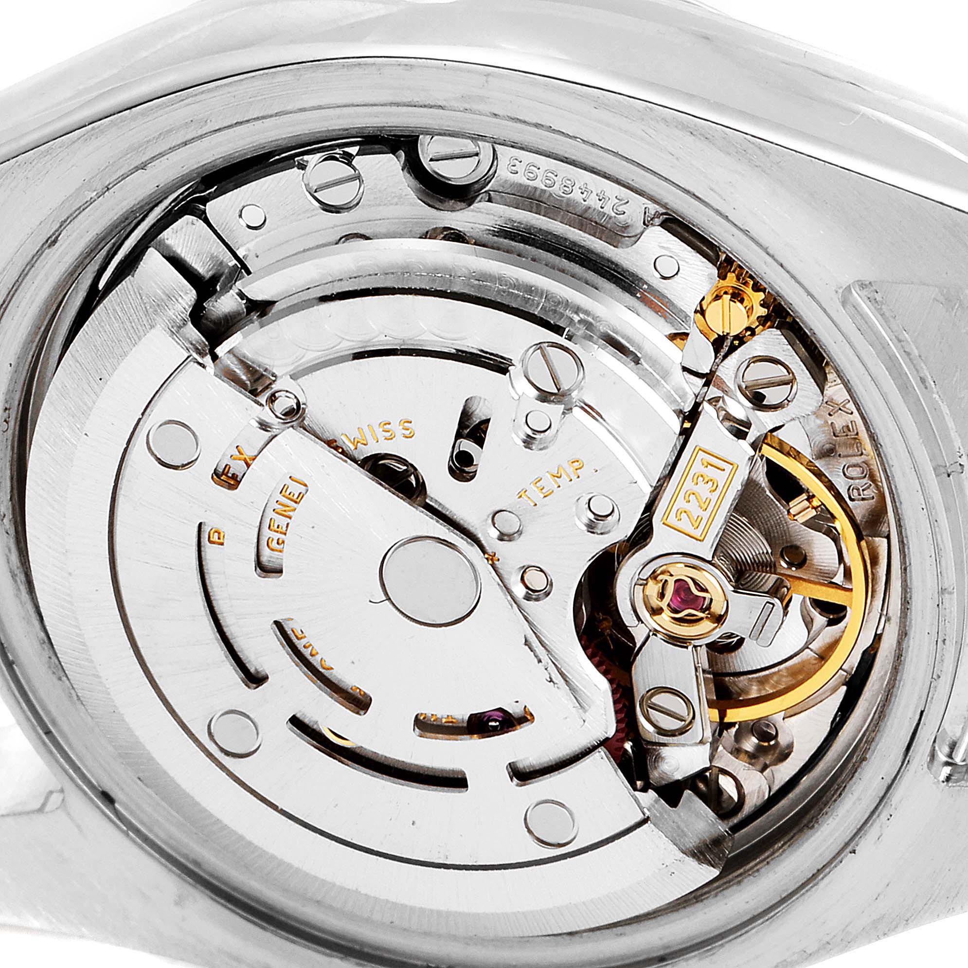 This image shows a close-up of the movement and internal mechanisms of a Rolex Oyster Perpetual 176200 Women's Stainless Steel Black Dial 176200 Women's Stainless Steel Black Dial watch.