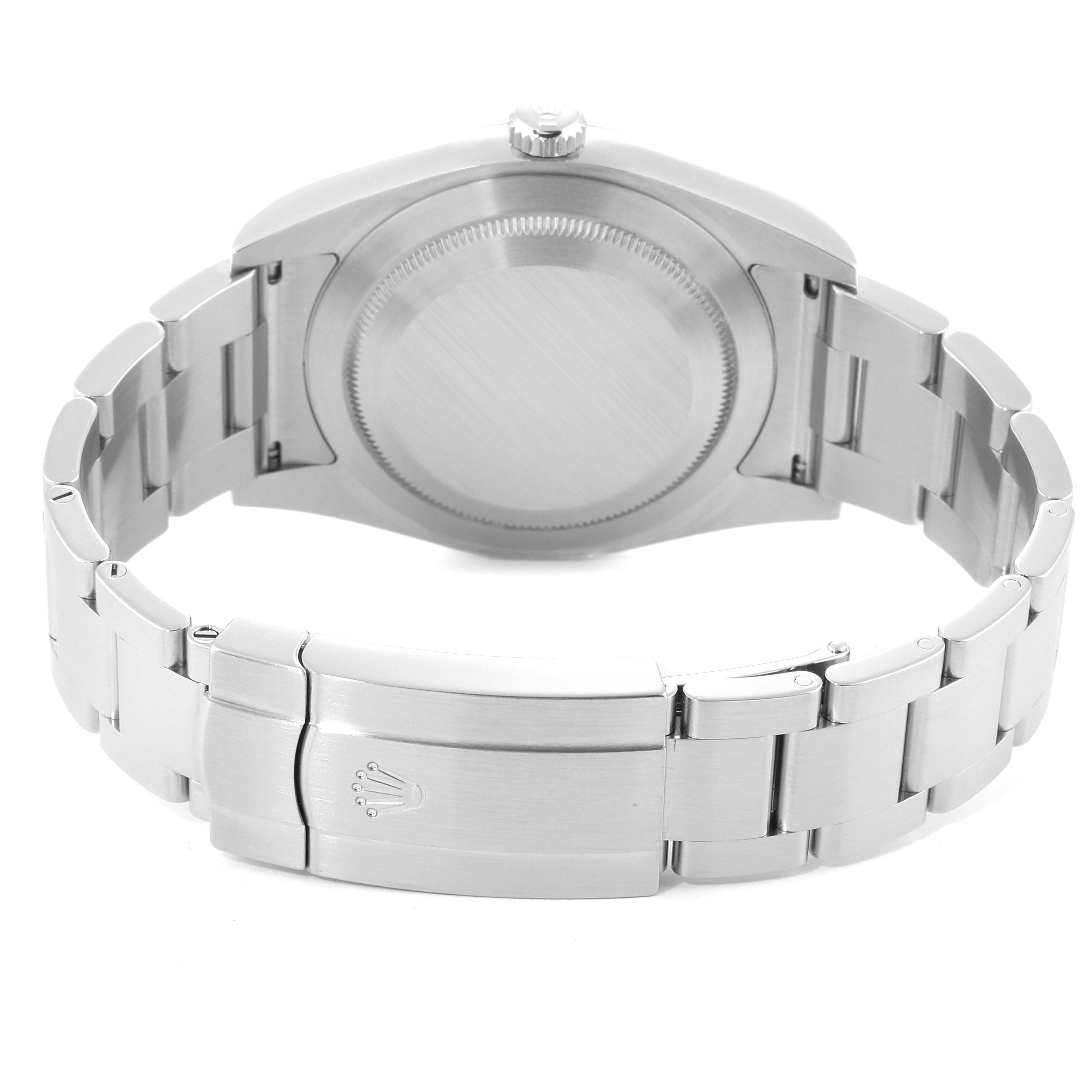 The image shows the back view of a Rolex Oyster Perpetual 114300 Men's Stainless Steel Blue Dial 114300 Men's Stainless Steel Blue Dial watch, highlighting the case back and metal bracelet with clasp.