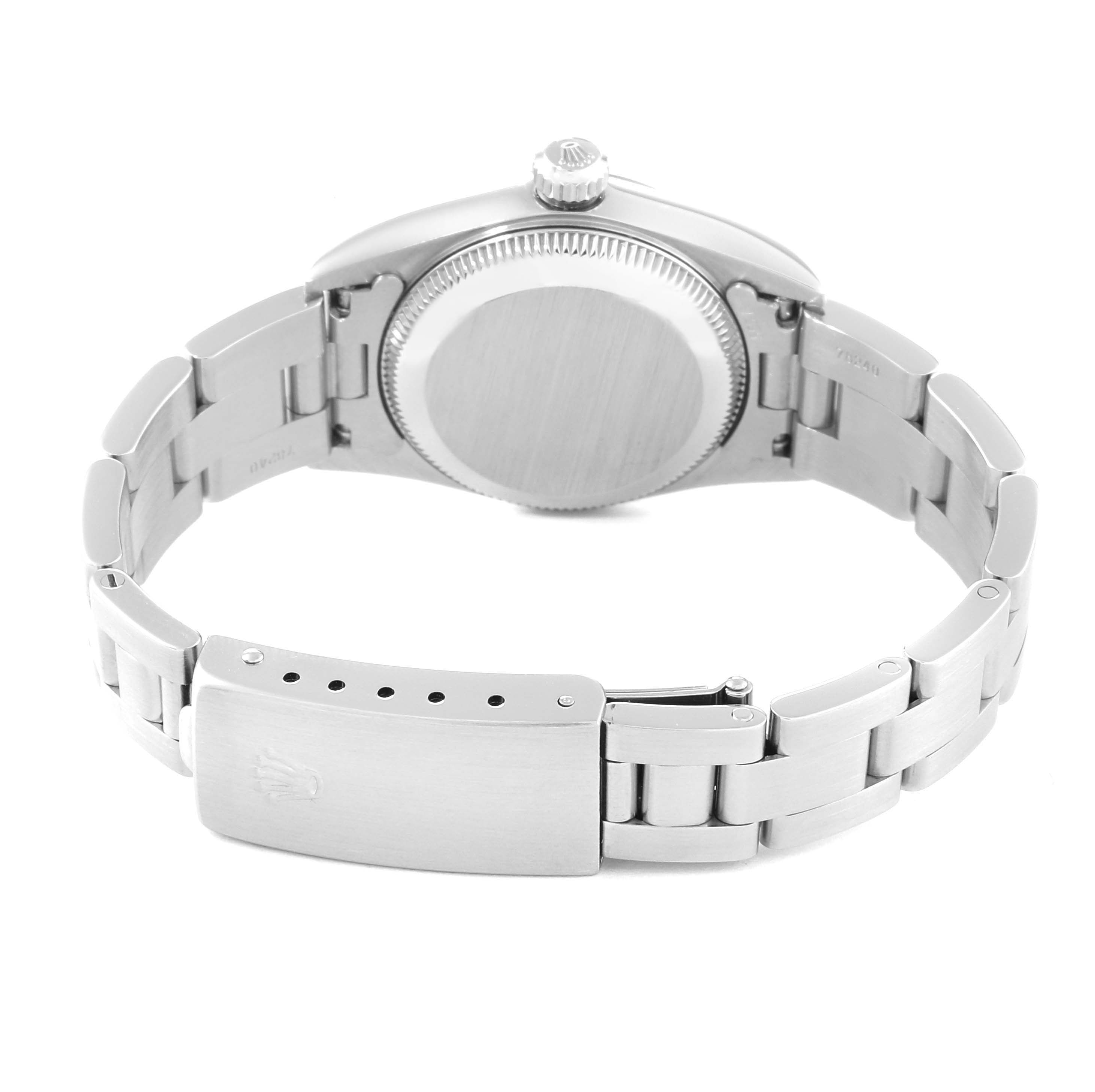 The image shows the back case and bracelet of a Rolex Oyster Perpetual 76030 Women's Stainless Steel Blue Dial 76030 Women's Stainless Steel Blue Dial watch from a rear angle.