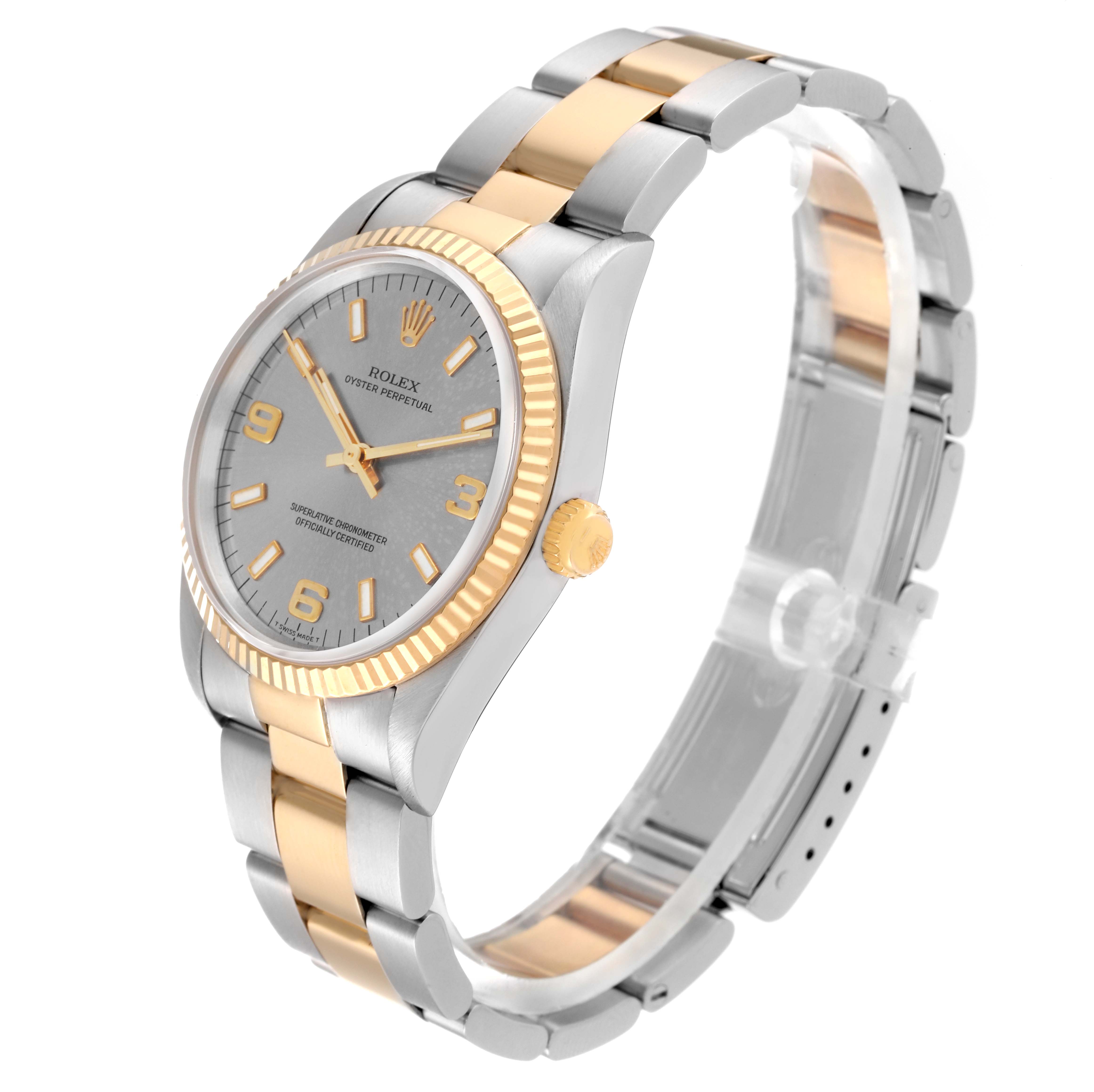 The Rolex Oyster Perpetual 14233 Men's Steel and Gold (two tone) Silver Dial 14233 Men's Steel and Gold (two tone) Silver Dial watch is shown at a three-quarter angle, highlighting its dial, bezel, crown, and bracelet.