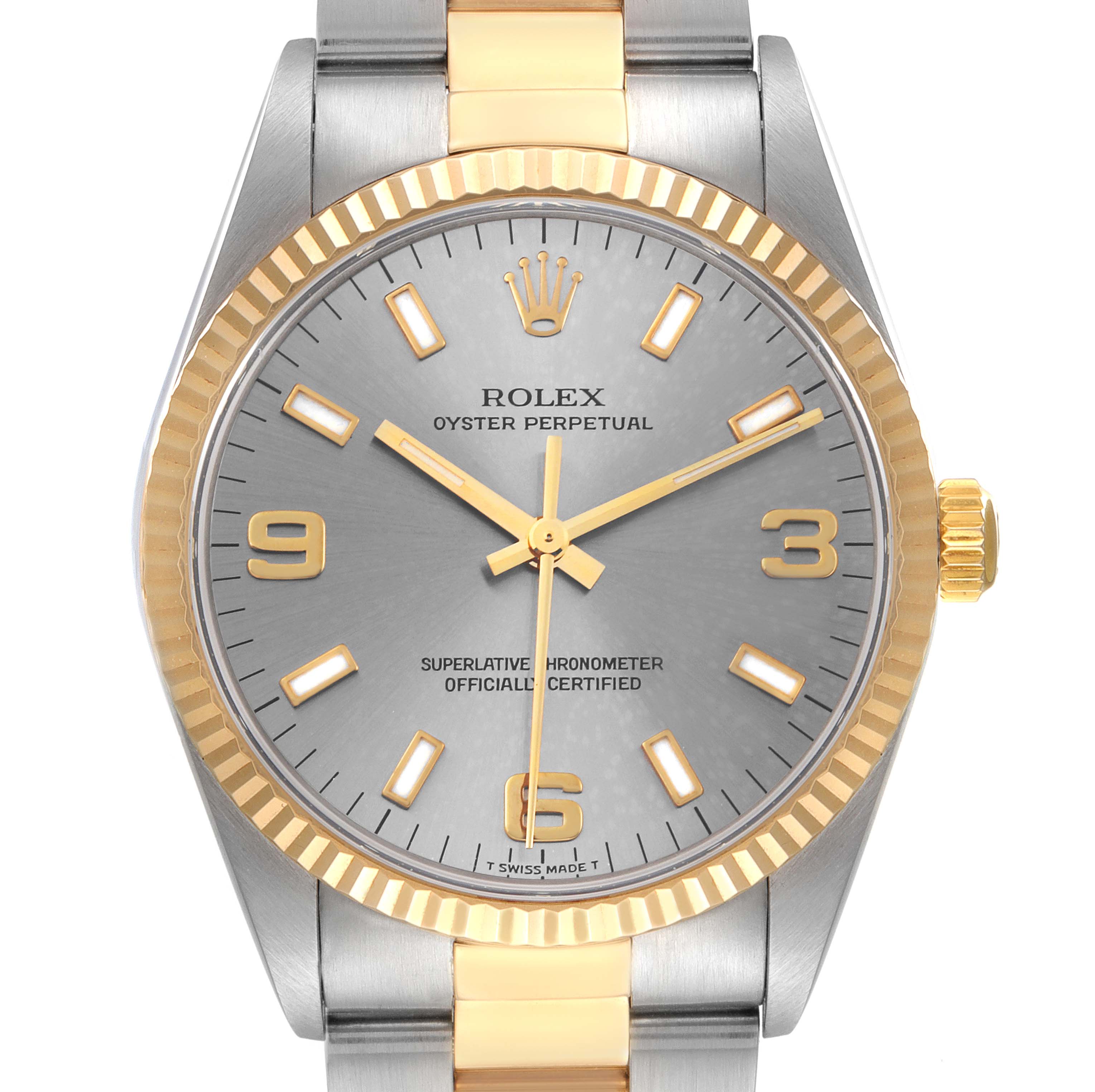 The image shows a Rolex Oyster Perpetual 14233 Men's Steel and Gold (two tone) Silver Dial 14233 Men's Steel and Gold (two tone) Silver Dial watch, focusing on the face, fluted bezel, and part of the bracelet, taken from a top view.