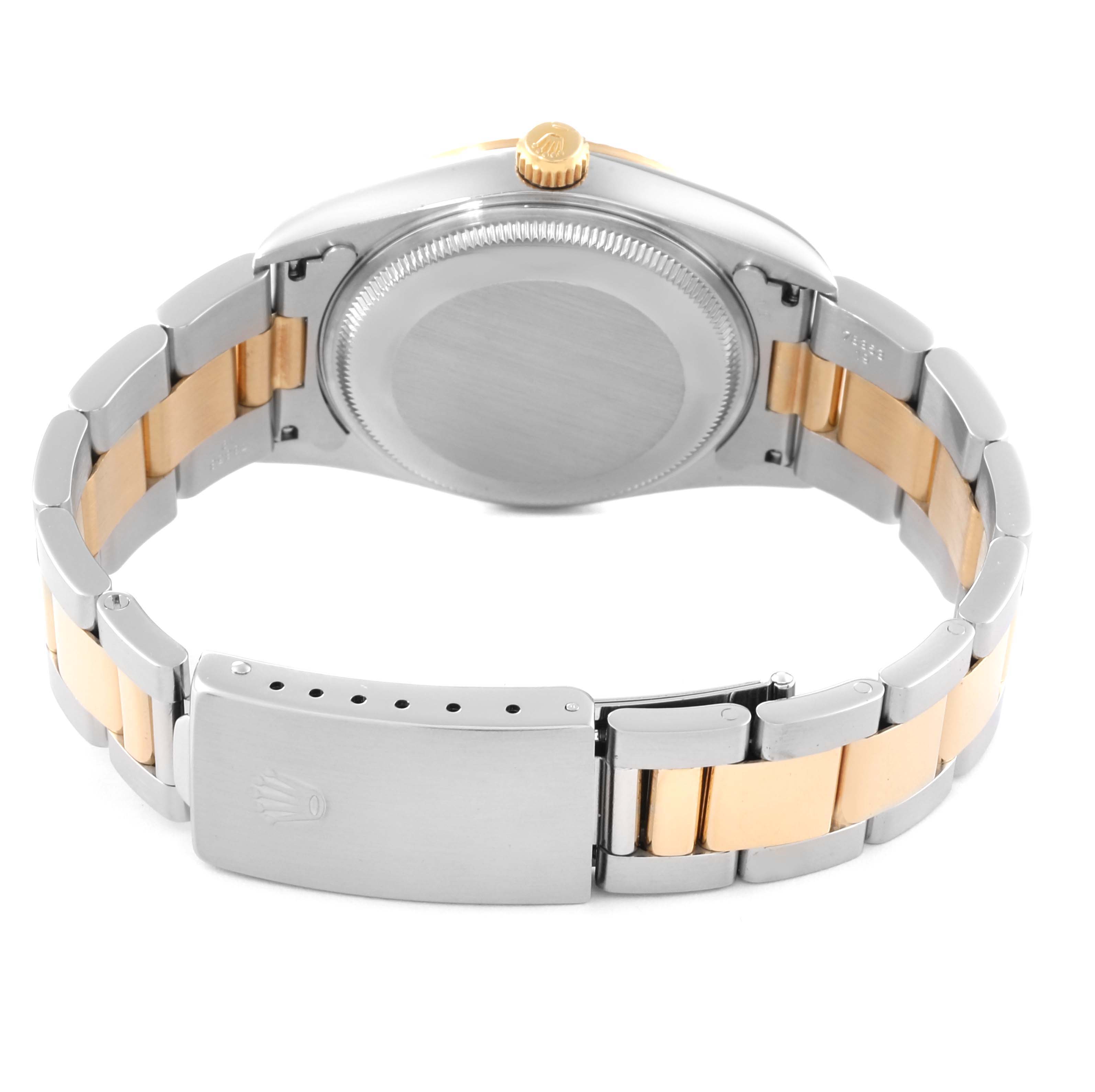 The image shows the back case and bracelet of a Rolex Oyster Perpetual 14233 Men's Steel and Gold (two tone) Silver Dial 14233 Men's Steel and Gold (two tone) Silver Dial watch, viewed from the rear.
