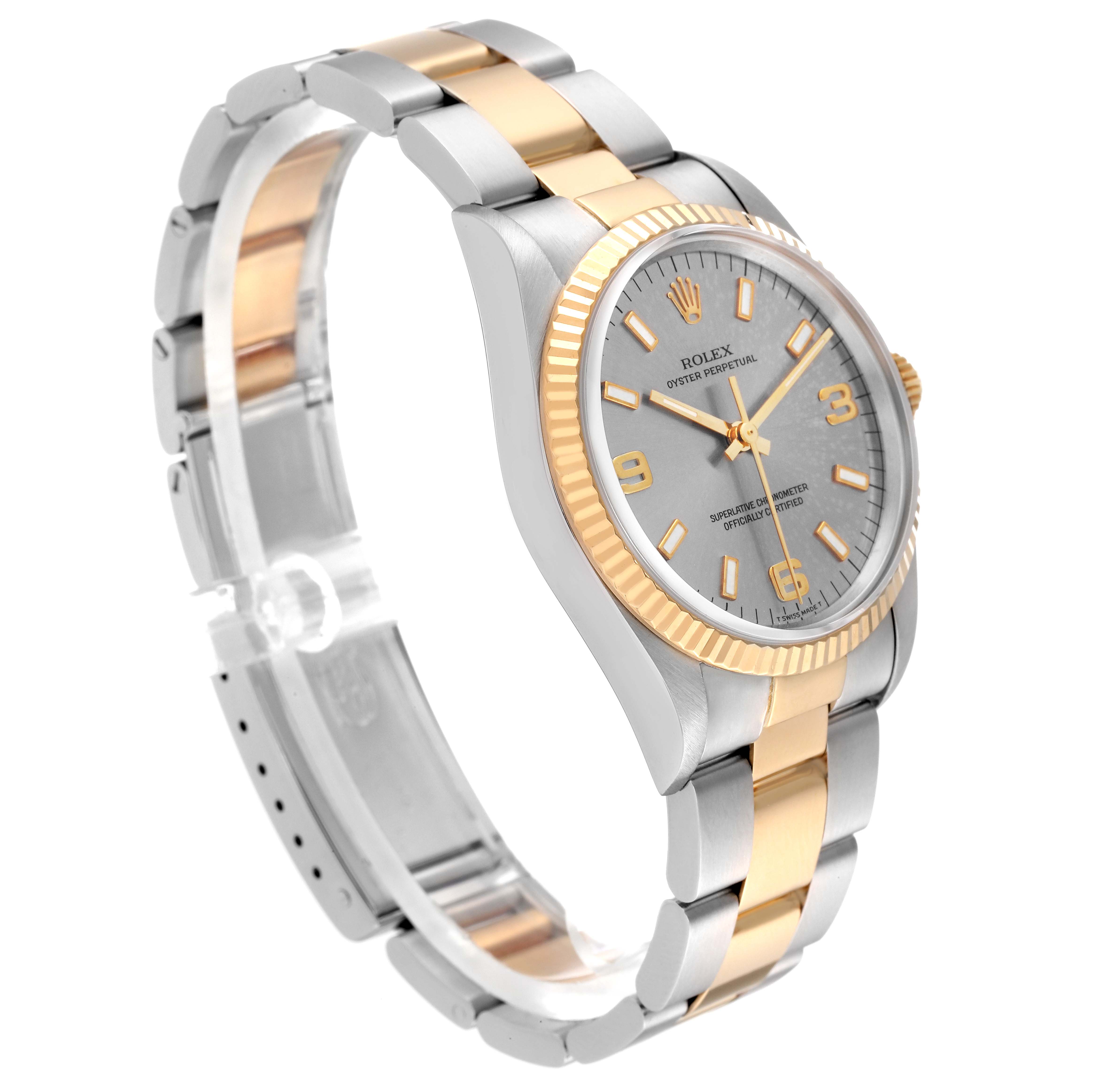 The Rolex Oyster Perpetual 14233 Men's Steel and Gold (two tone) Silver Dial 14233 Men's Steel and Gold (two tone) Silver Dial watch is shown at a slight angle, displaying the dial, bezel, and part of the bracelet.