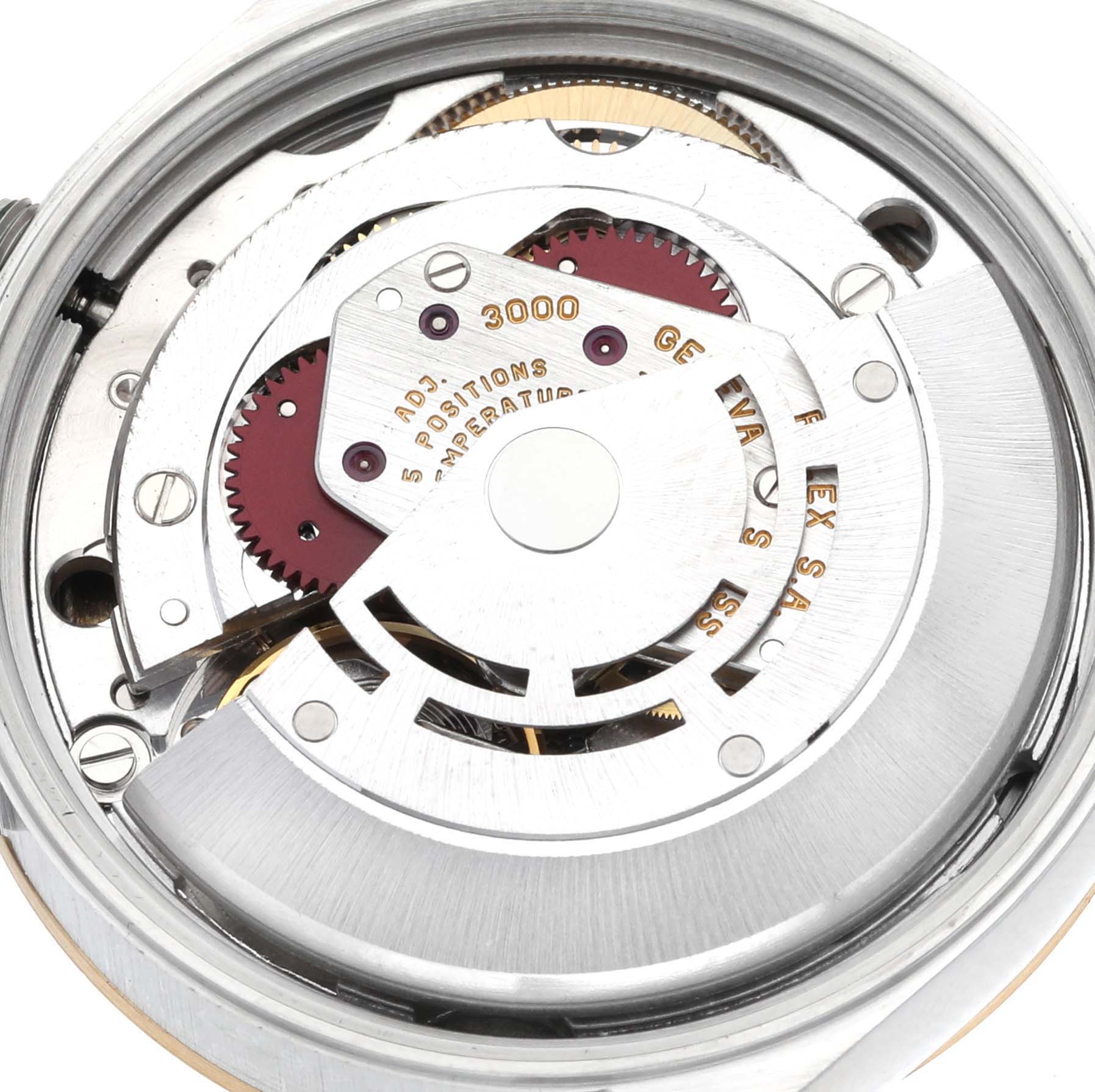 This image shows the movement and internal mechanism of a Rolex Oyster Perpetual 14233 Men's Steel and Gold (two tone) Silver Dial 14233 Men's Steel and Gold (two tone) Silver Dial watch from a top-down angle.