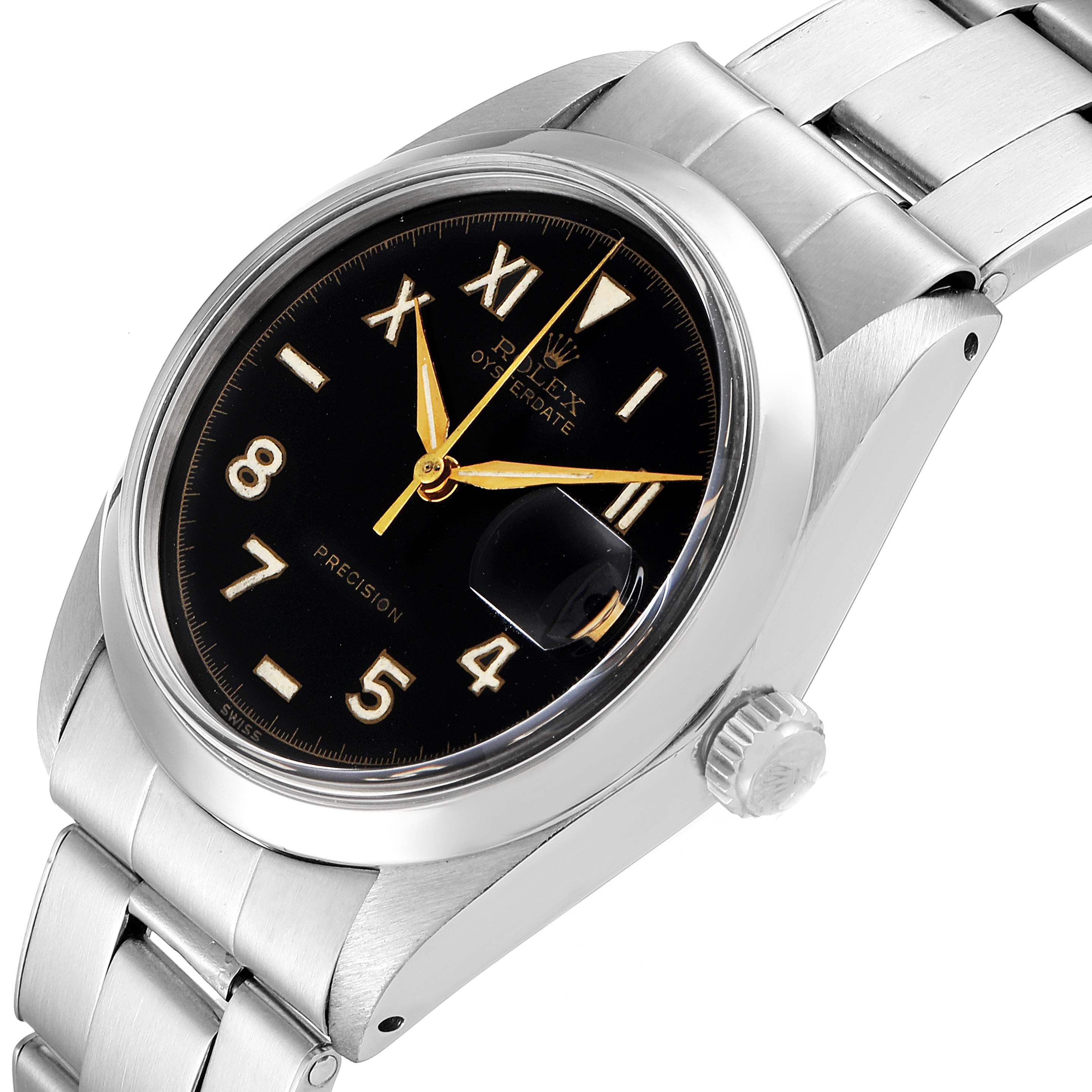 This is a close-up angle of the Rolex Date 6694 Men's Stainless Steel Black Dial 6694 Men's Stainless Steel Black Dial watch model, showing the dial, crown, and a portion of the bracelet.